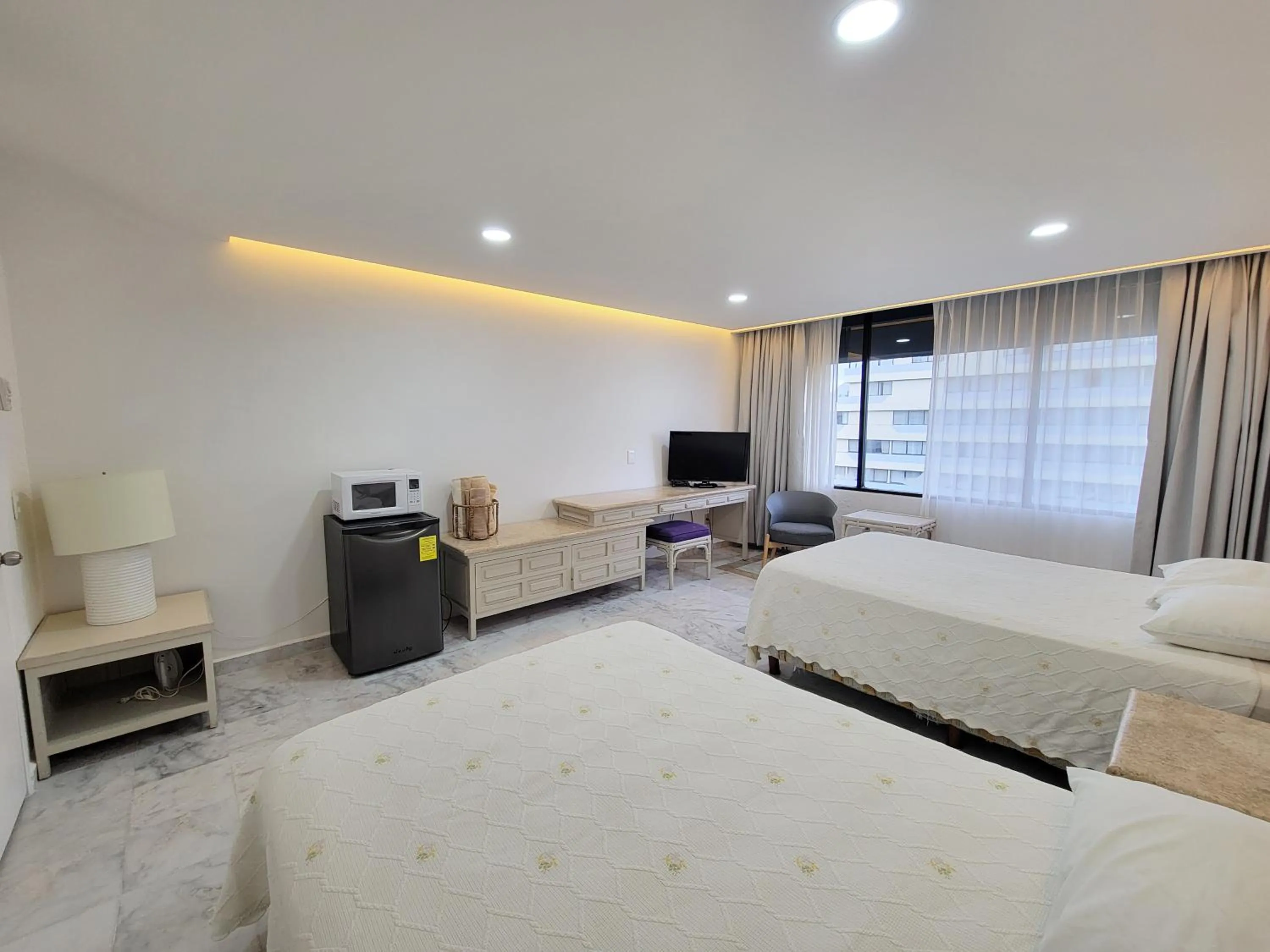 Bedroom, Bed in Beachfront Getaway Condo