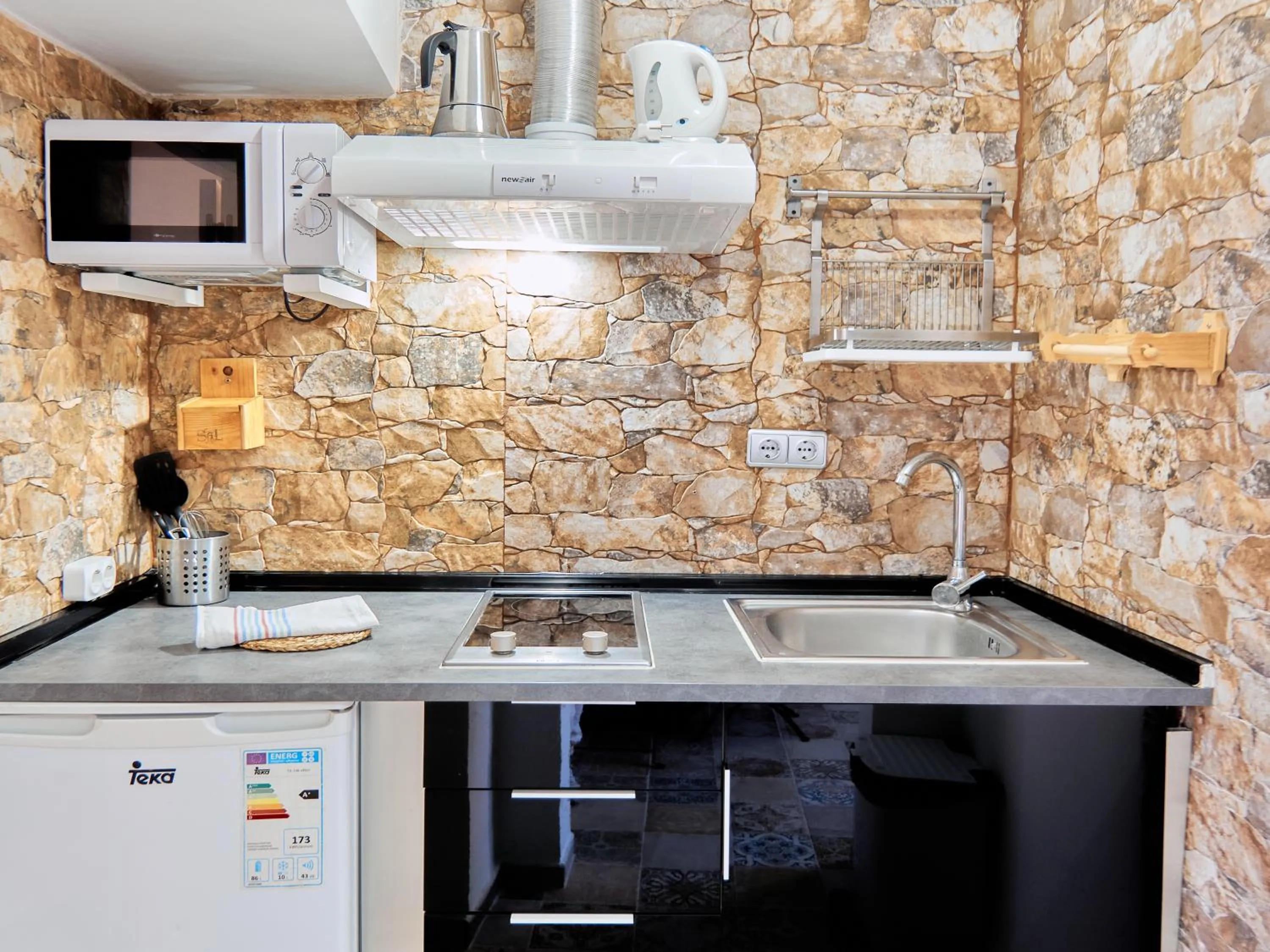 Kitchen or kitchenette in Apartamentos Jerez