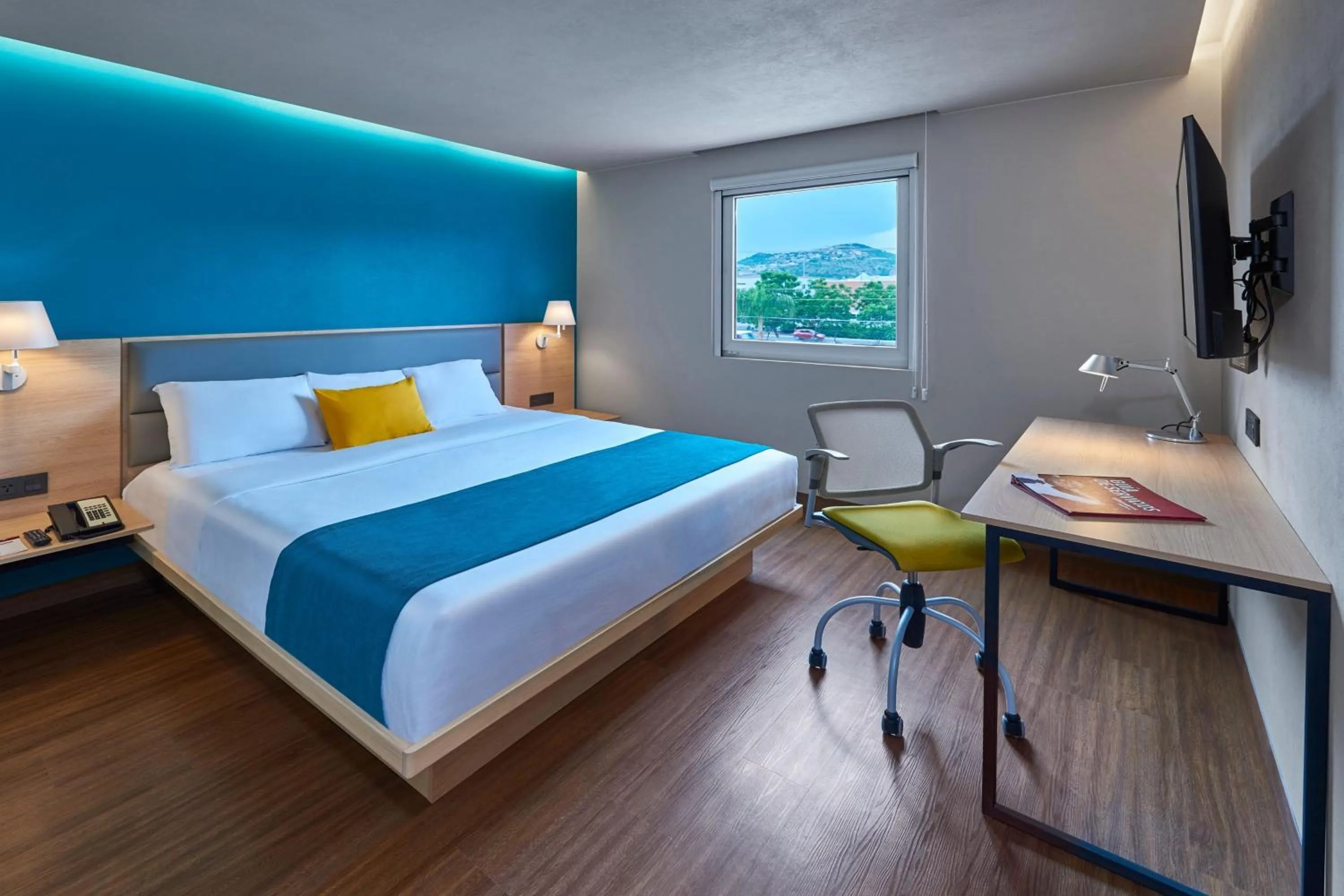 Bedroom in City Express Suites by Marriott Cancún Aeropuerto