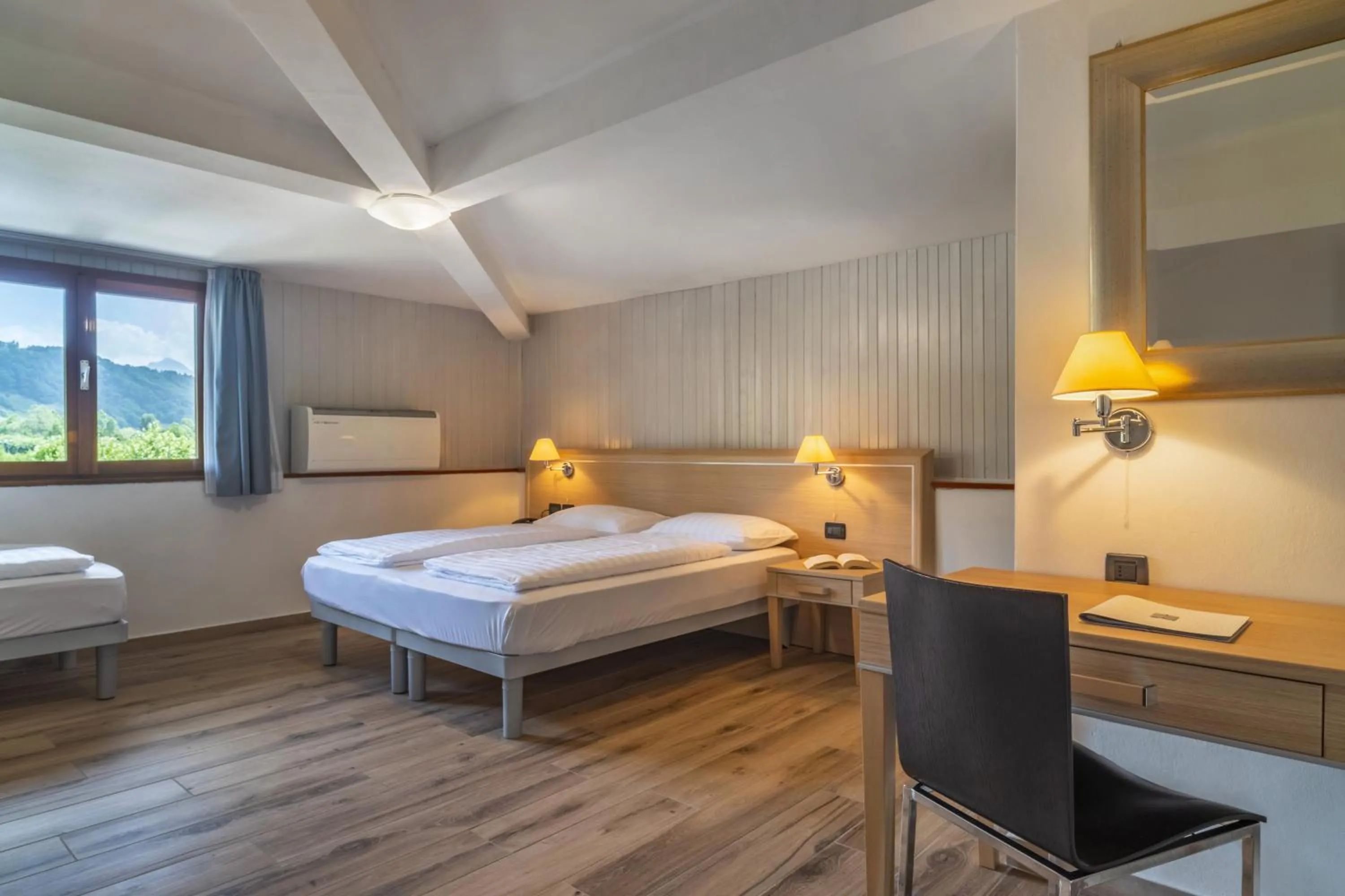 Bed in Garnì Bellavista