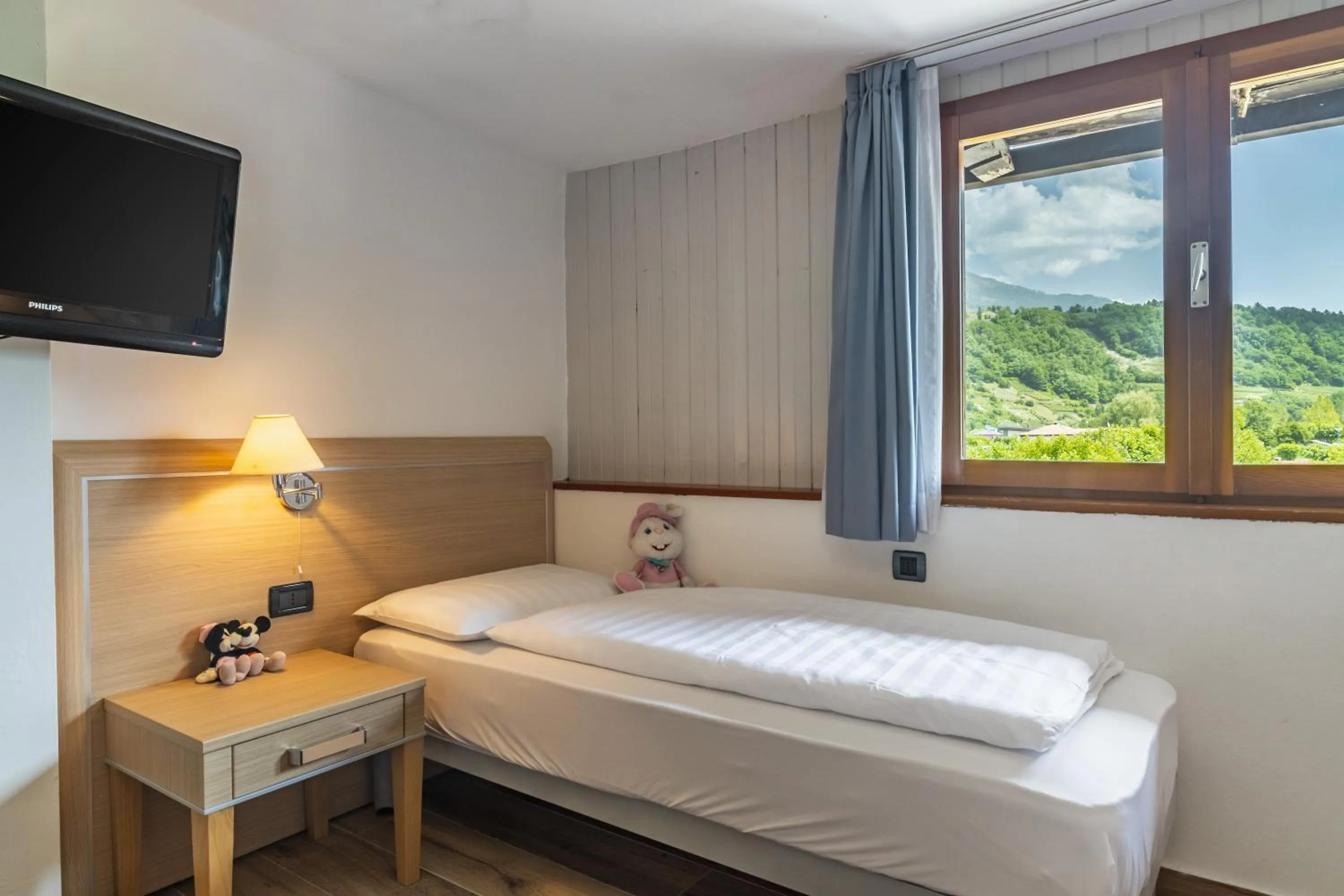 Bed in Garnì Bellavista