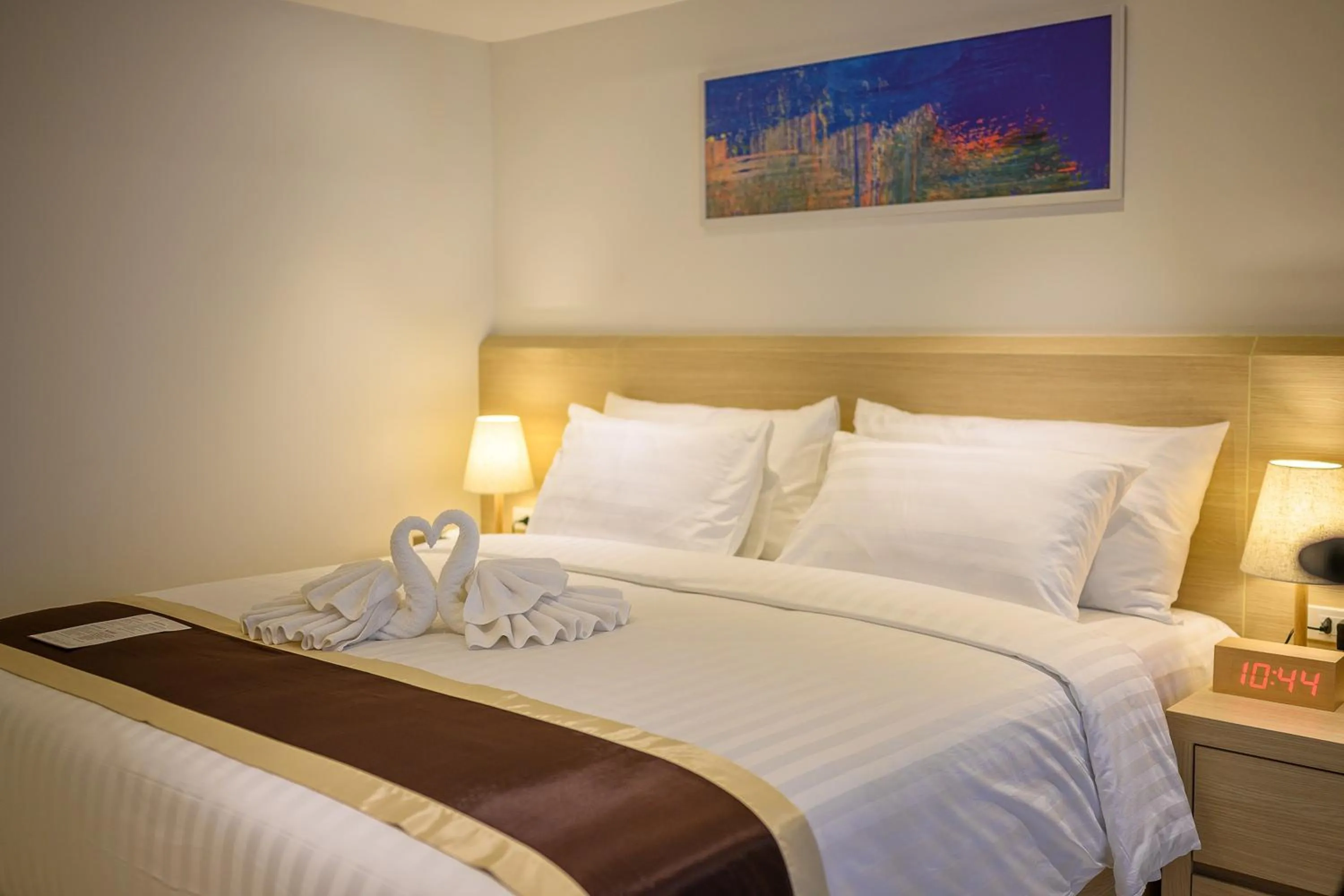 Bed in The Beachfront Hotel Phuket