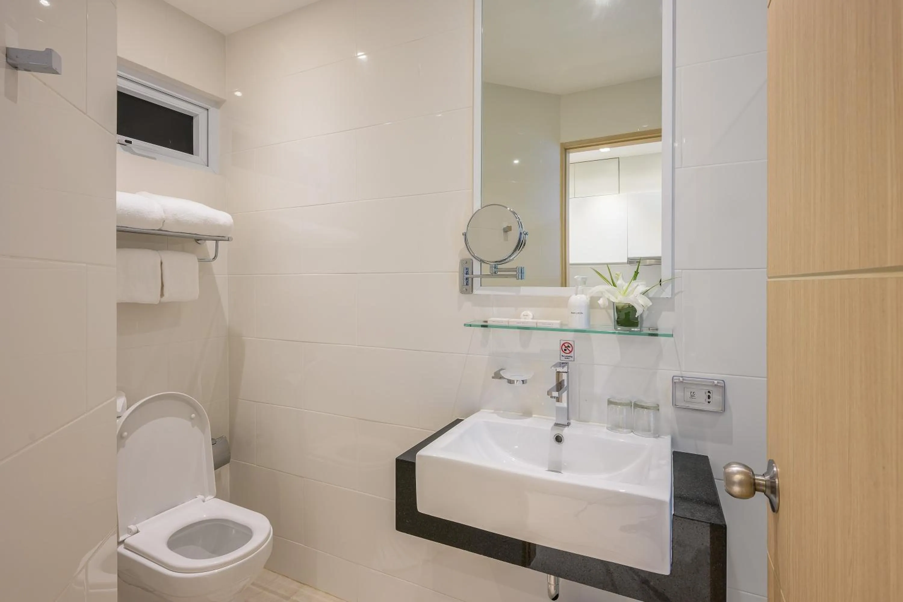 Bathroom in The Beachfront Hotel Phuket