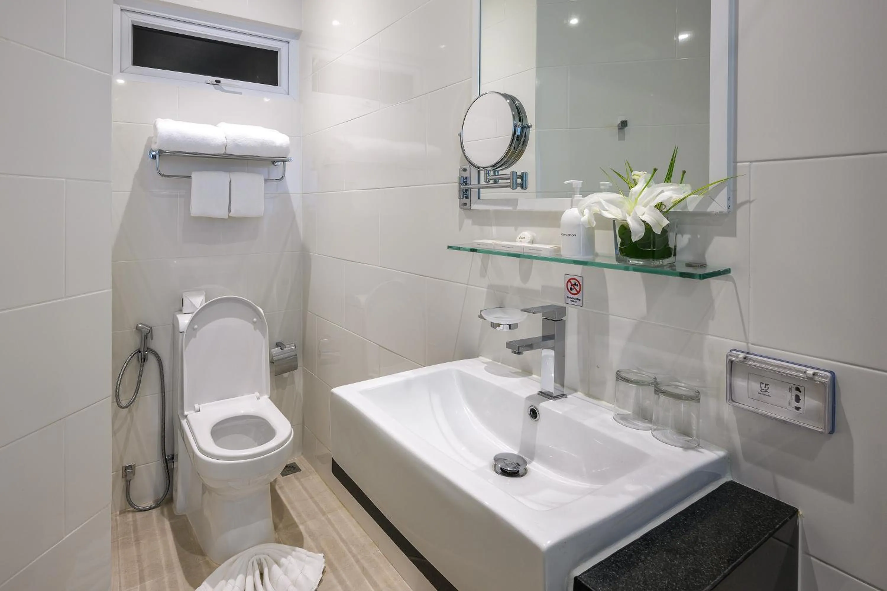 Bathroom in The Beachfront Hotel Phuket