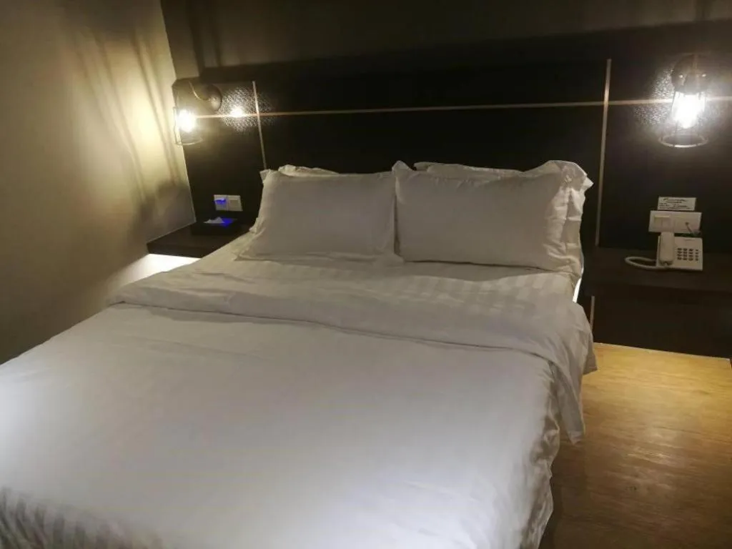 Bed in Riverside Boutique Hotel