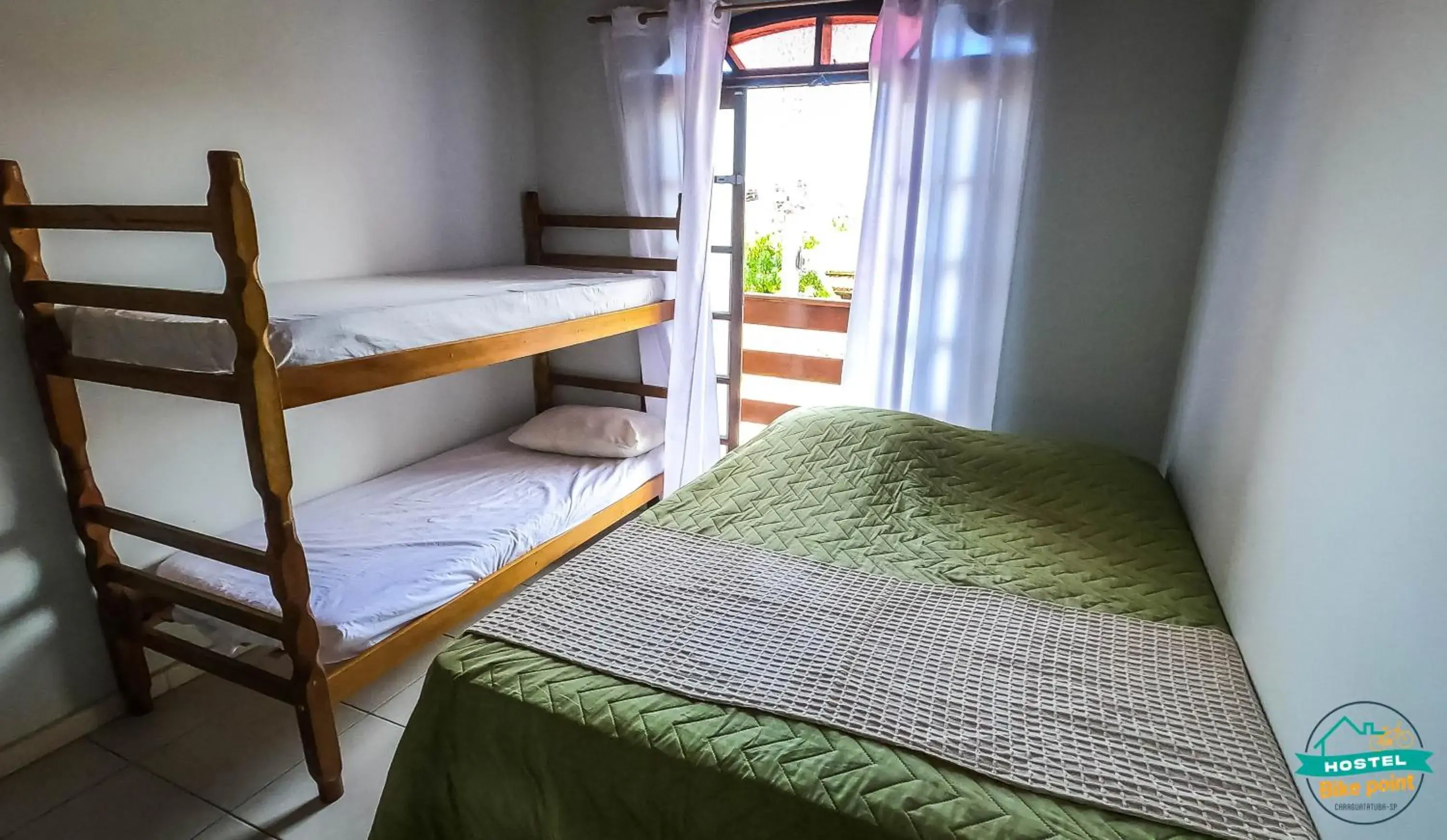 Quadruple Room in Guest house Bike Point Caraguatatuba Quadruple Room in Guest house Bike Point Caraguatatuba