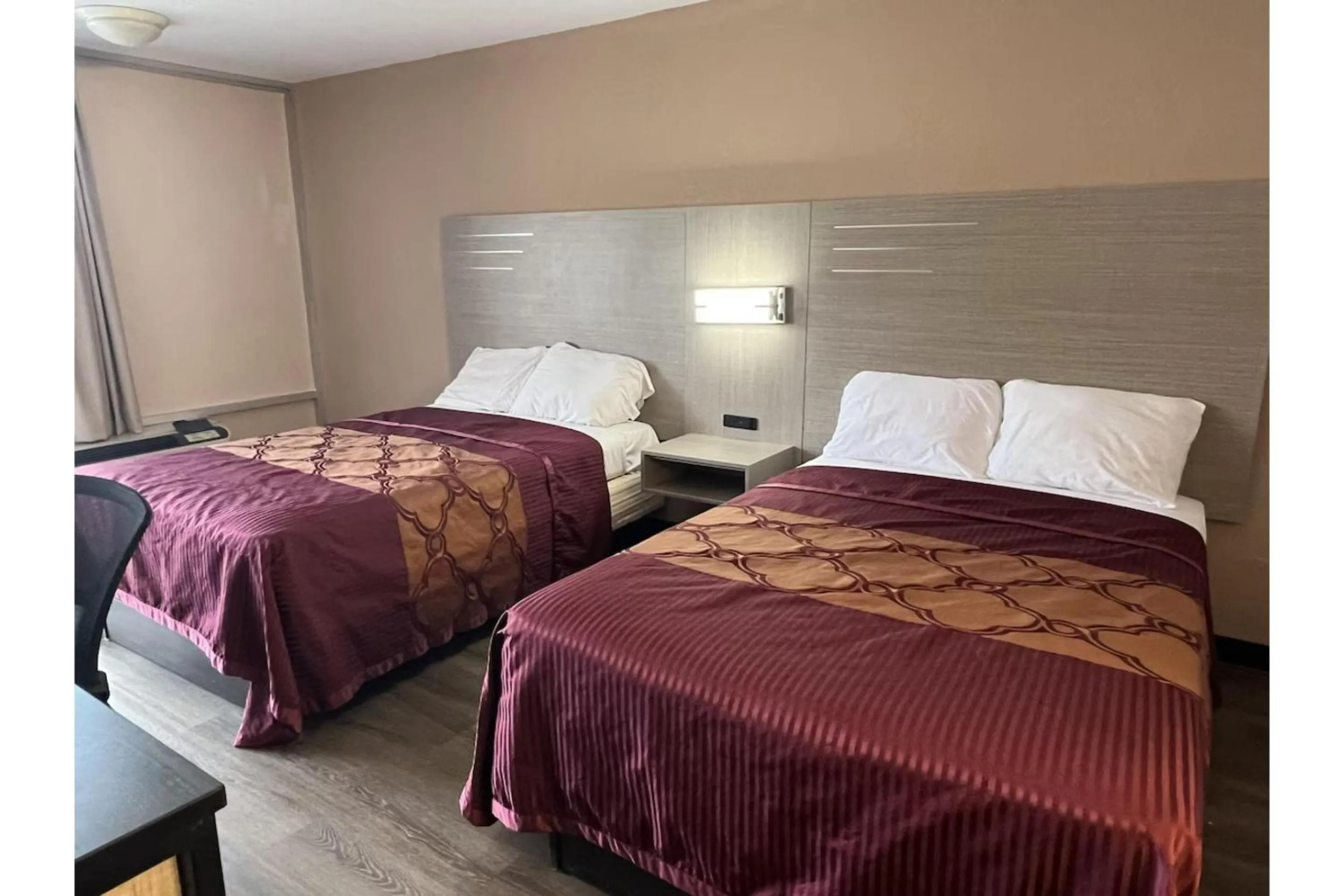 Bedroom in Western Motel By OYO Hattiesburg