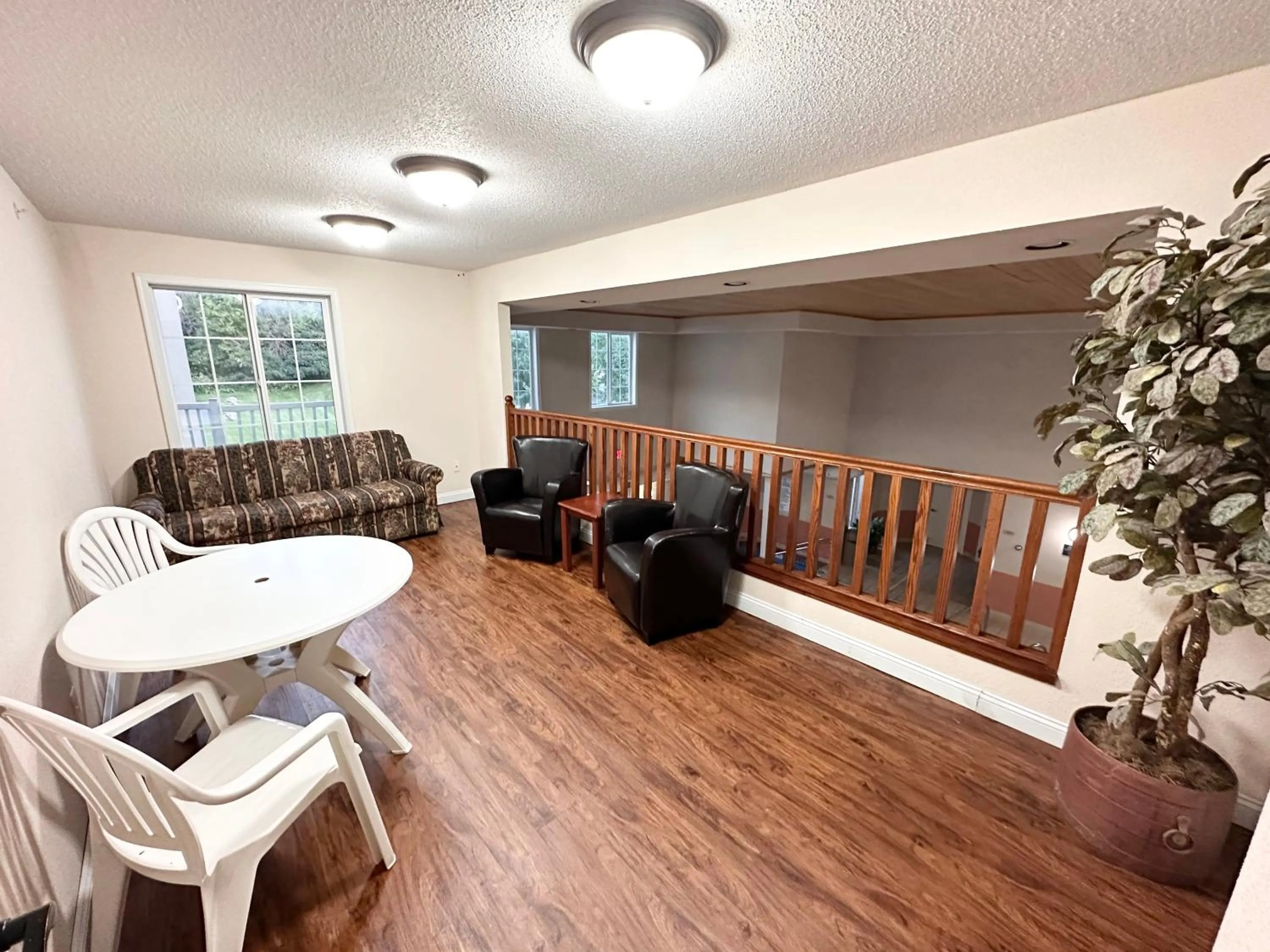 Seating area in MainStay Suites Madison Airport