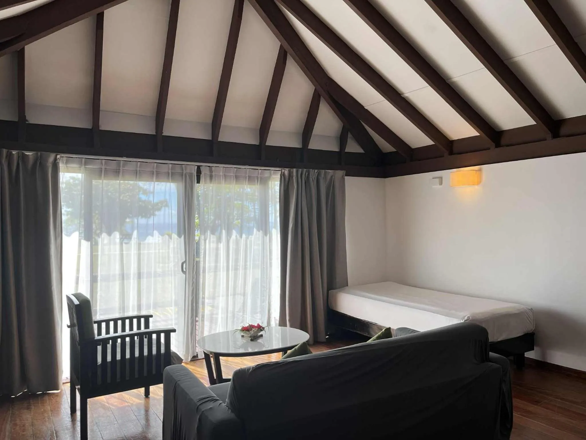 Seating area, Bed in Mana Island Resort & Spa - Fiji