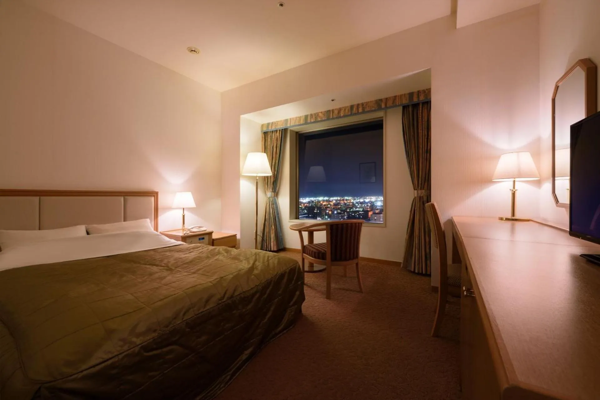 Bedroom in Grand Hotel New Oji