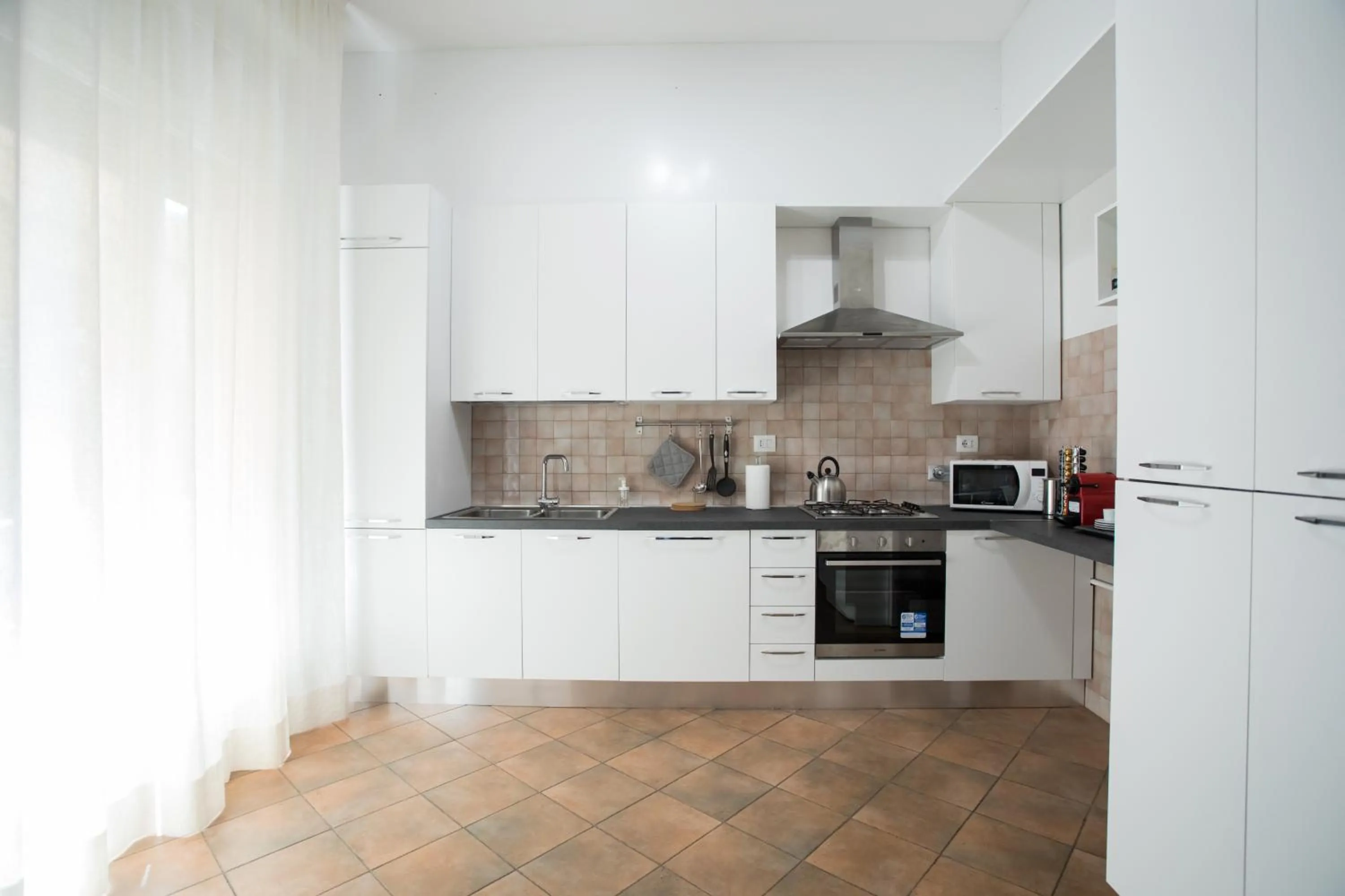 Kitchen or kitchenette in Affittacamere Le Camere di Porta San Felice - Self Check in