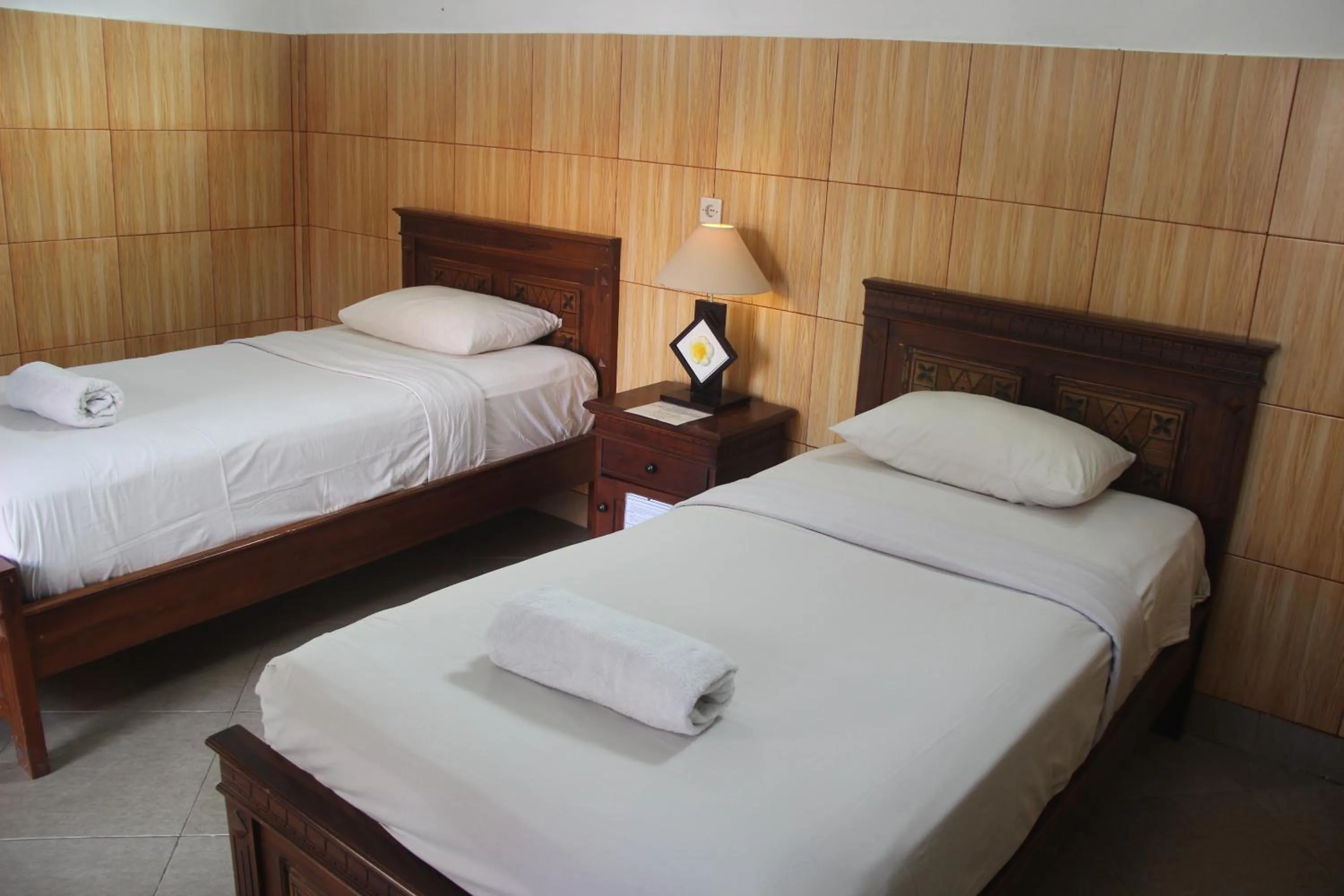 Bed in Nitya Home Stay Lembongan