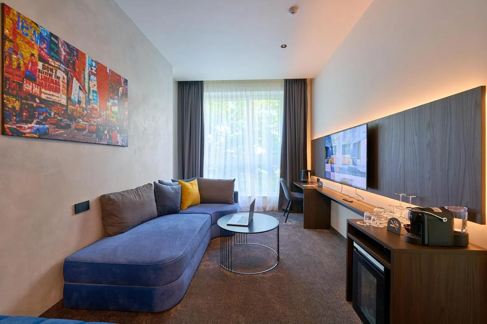 Communal lounge/ TV room in Adella Boutique Hotel - Free Secured Parking