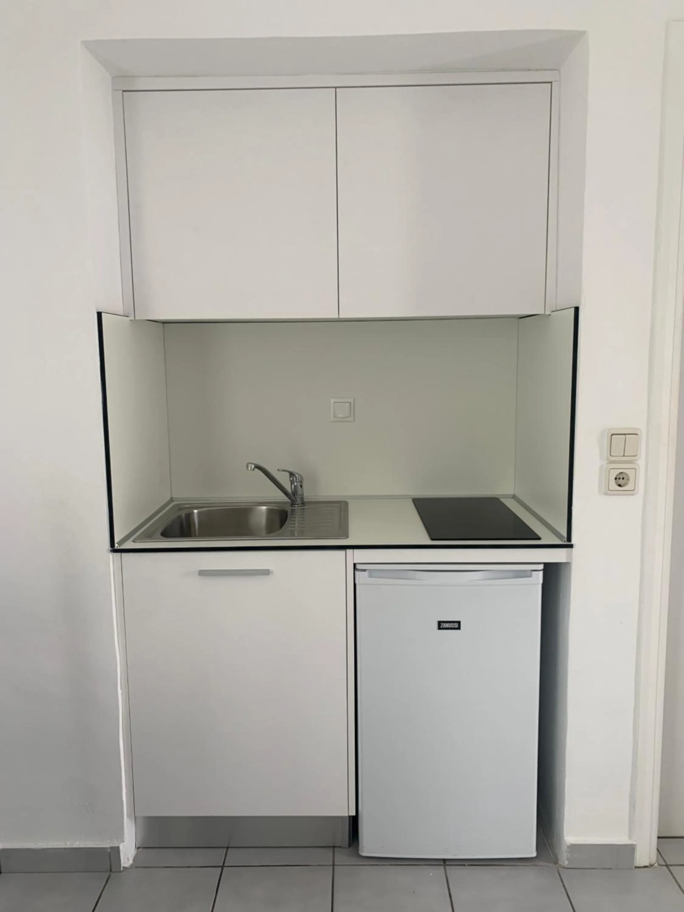 Kitchen or kitchenette in Astra Hotel Apartments