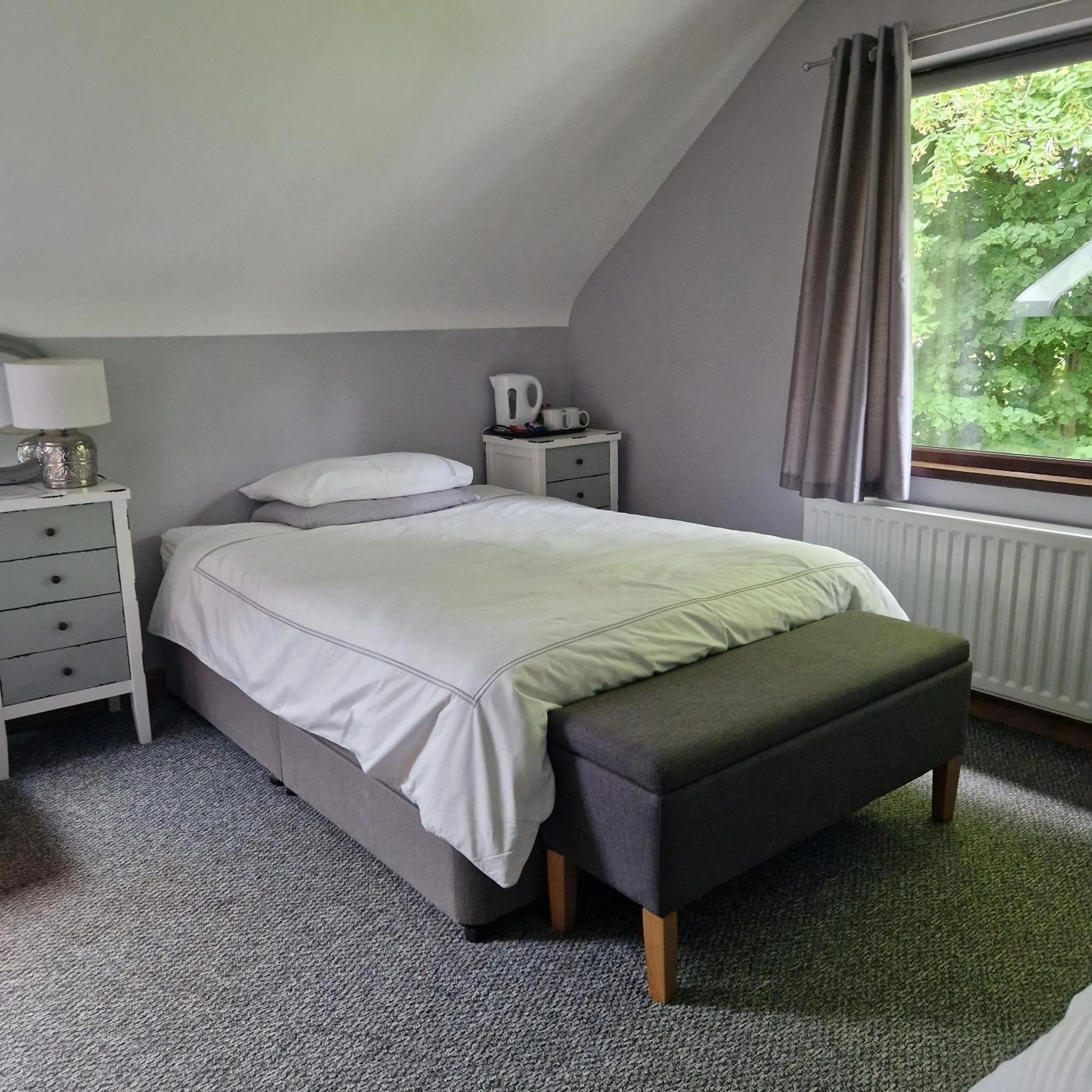 Bed in The Tree-house B&B