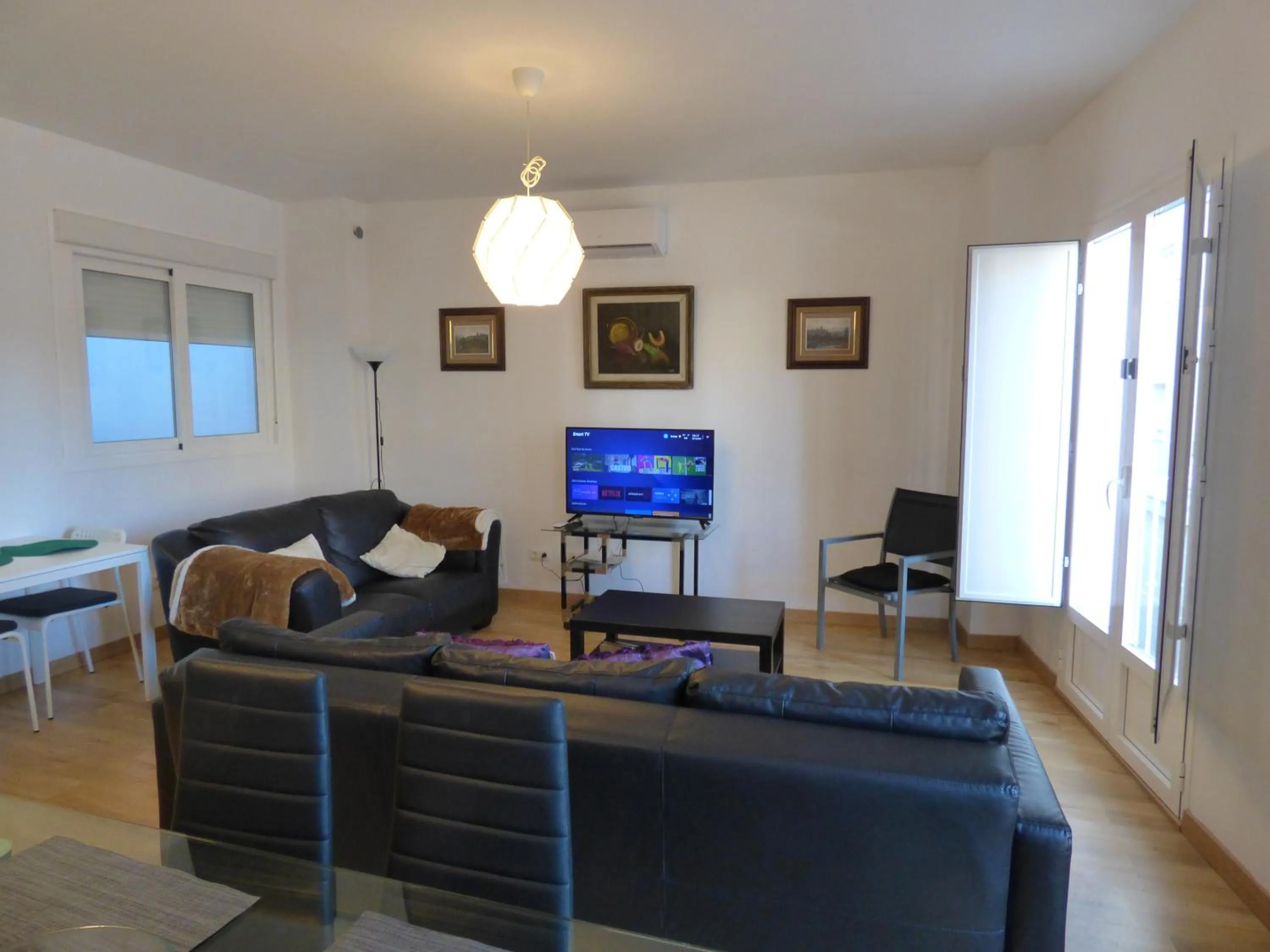 Communal lounge/ TV room in Viviendas Turísticas La Merced