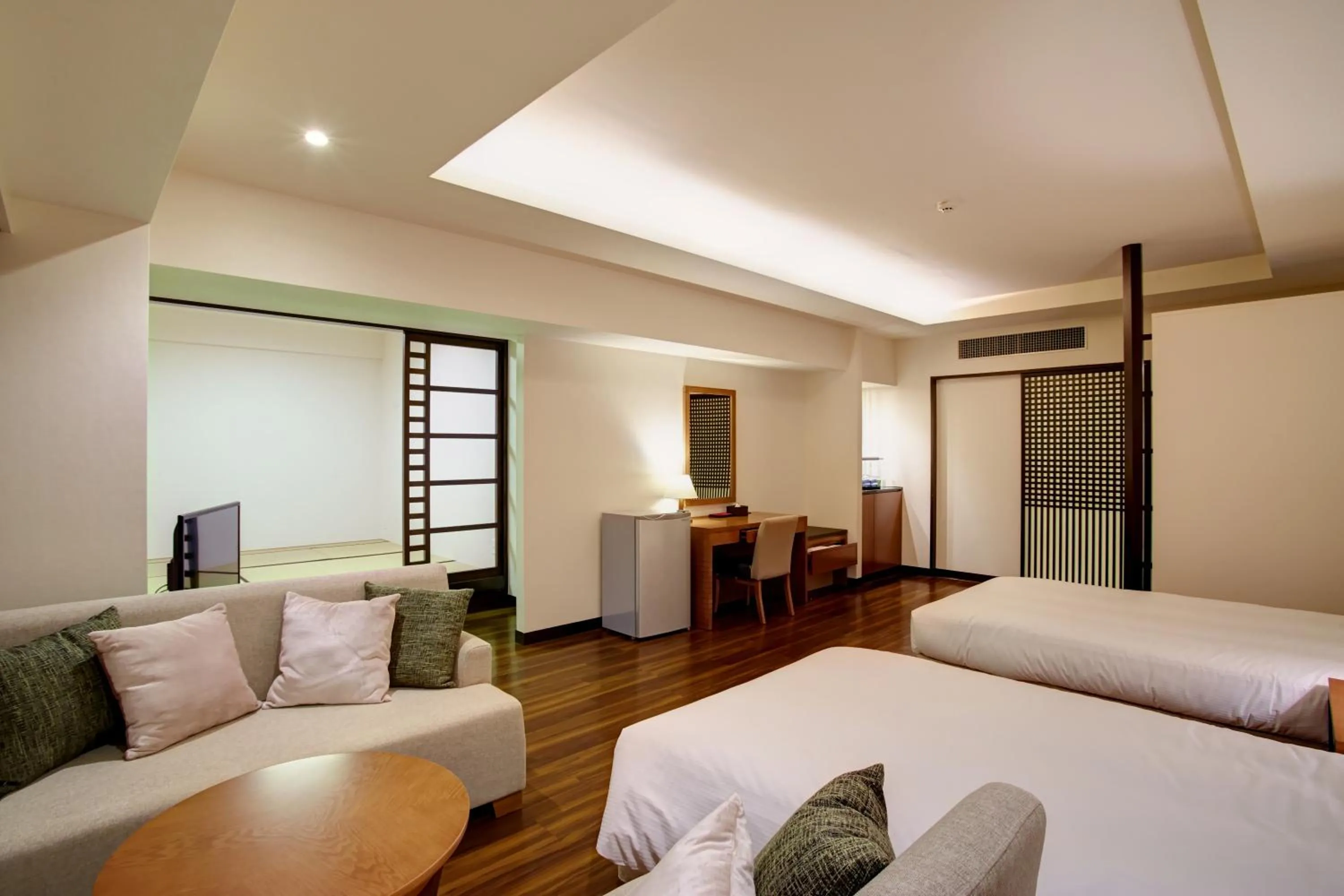 Photo of the whole room, Bed in Hotel Mahaina Wellness Resorts Okinawa