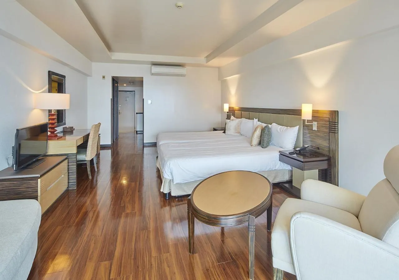 Photo of the whole room, Bed in Hotel Mahaina Wellness Resorts Okinawa