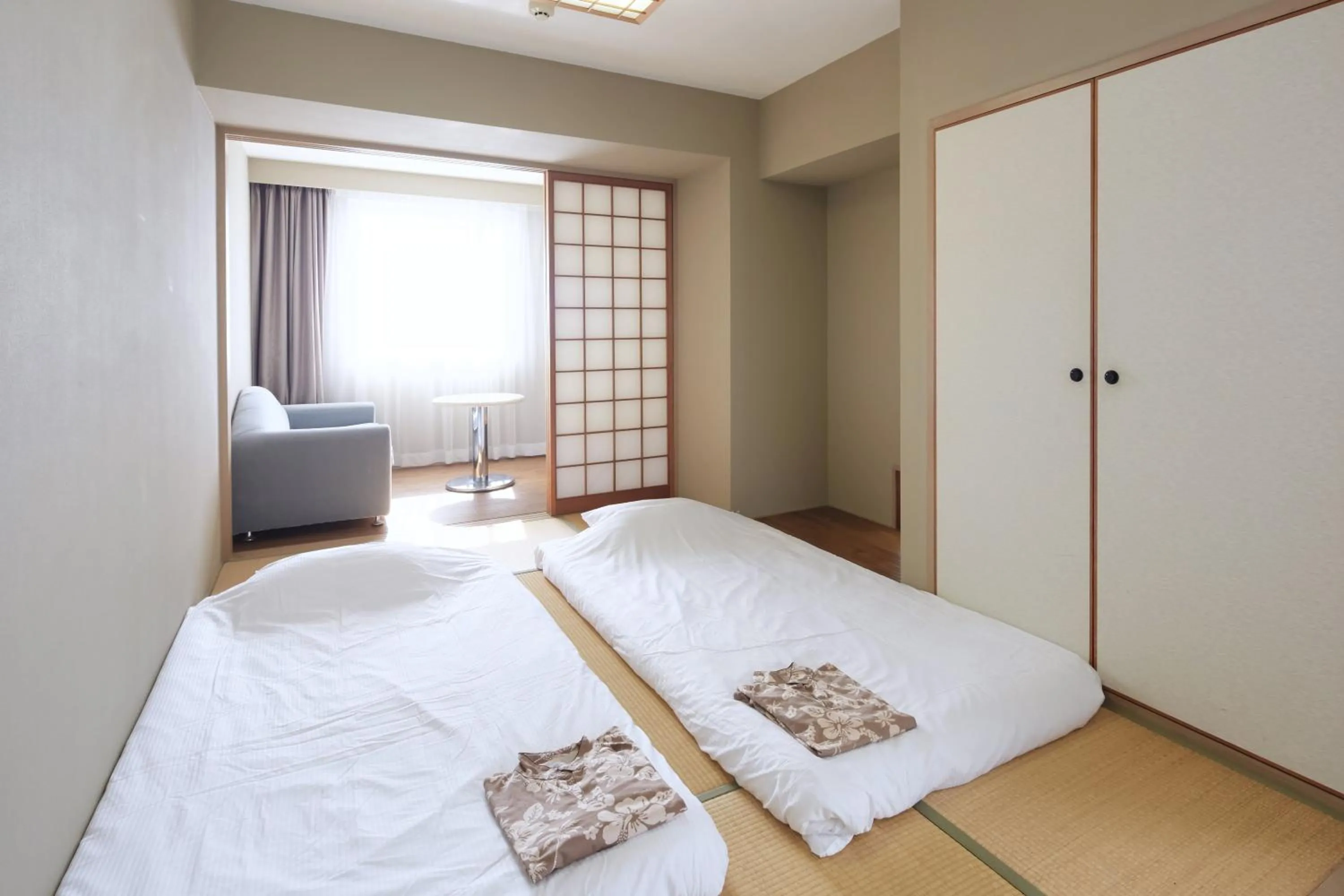 Photo of the whole room, Bed in Hotel Mahaina Wellness Resorts Okinawa