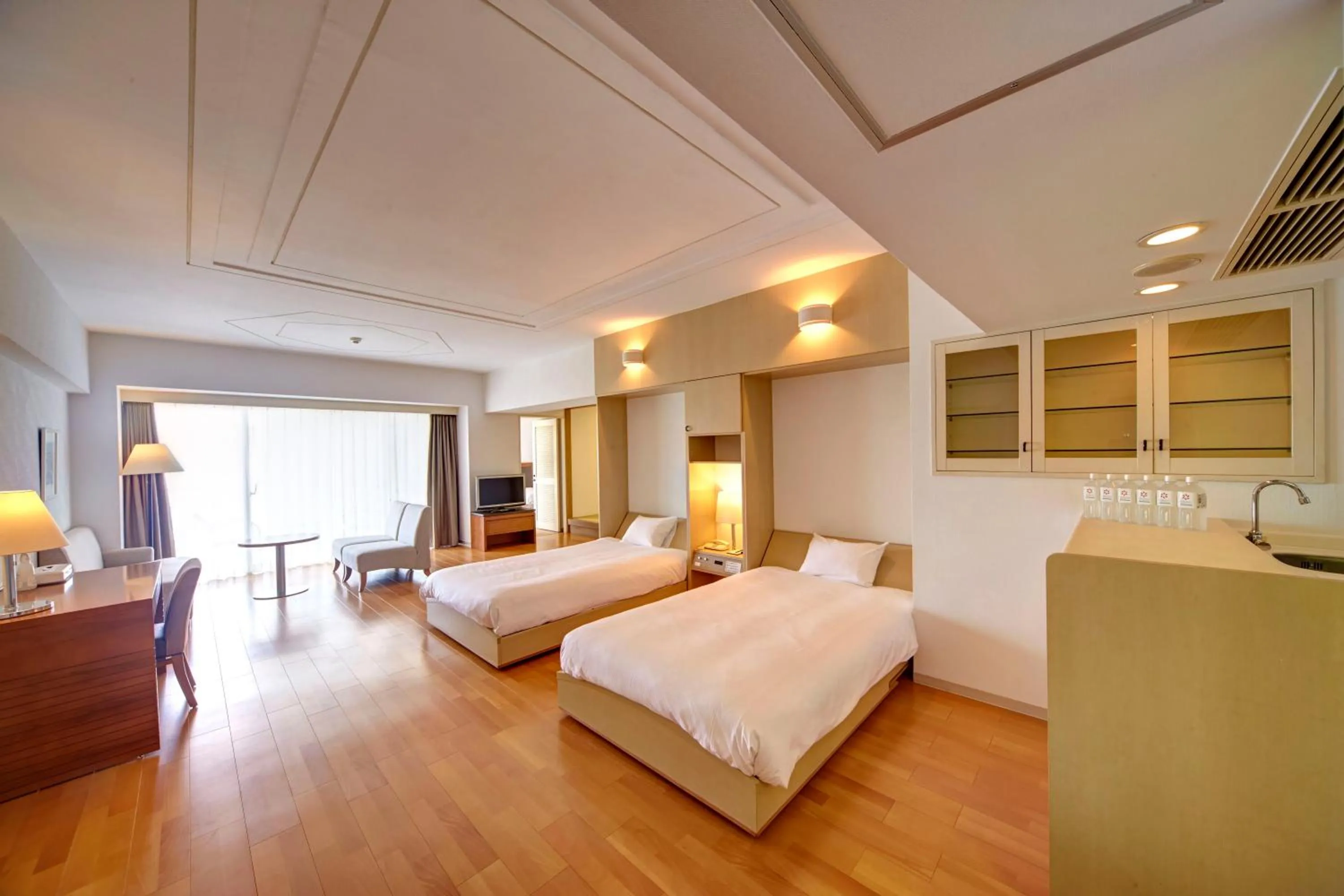 Photo of the whole room, Bed in Hotel Mahaina Wellness Resorts Okinawa