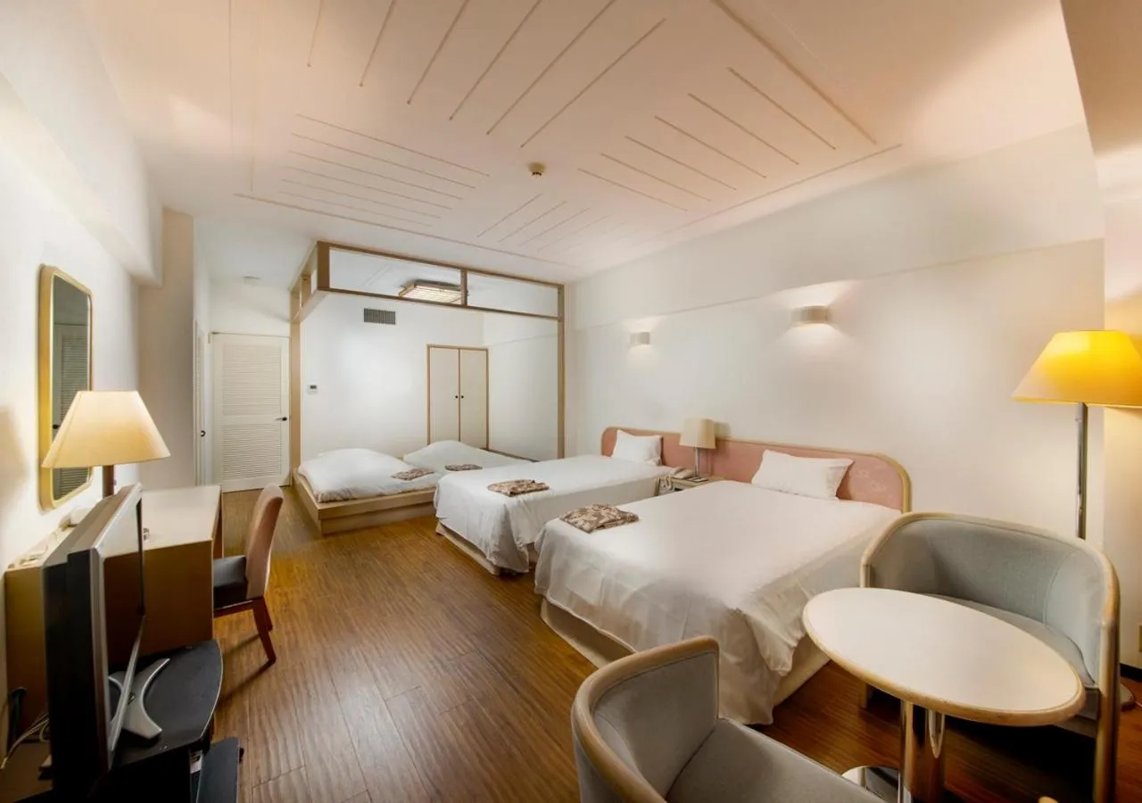 Photo of the whole room, Bed in Hotel Mahaina Wellness Resorts Okinawa