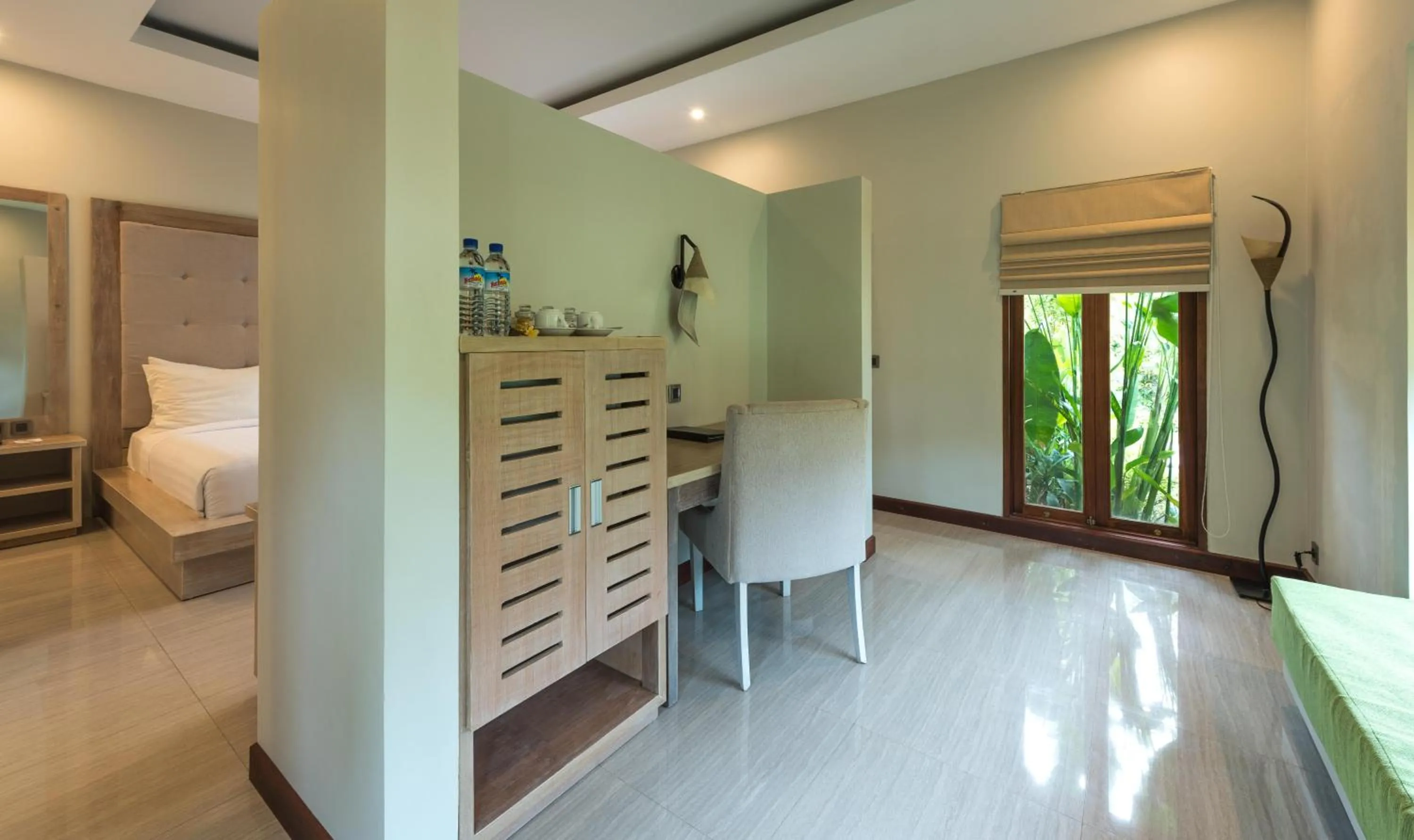 Bed in Living Asia Resort and Spa