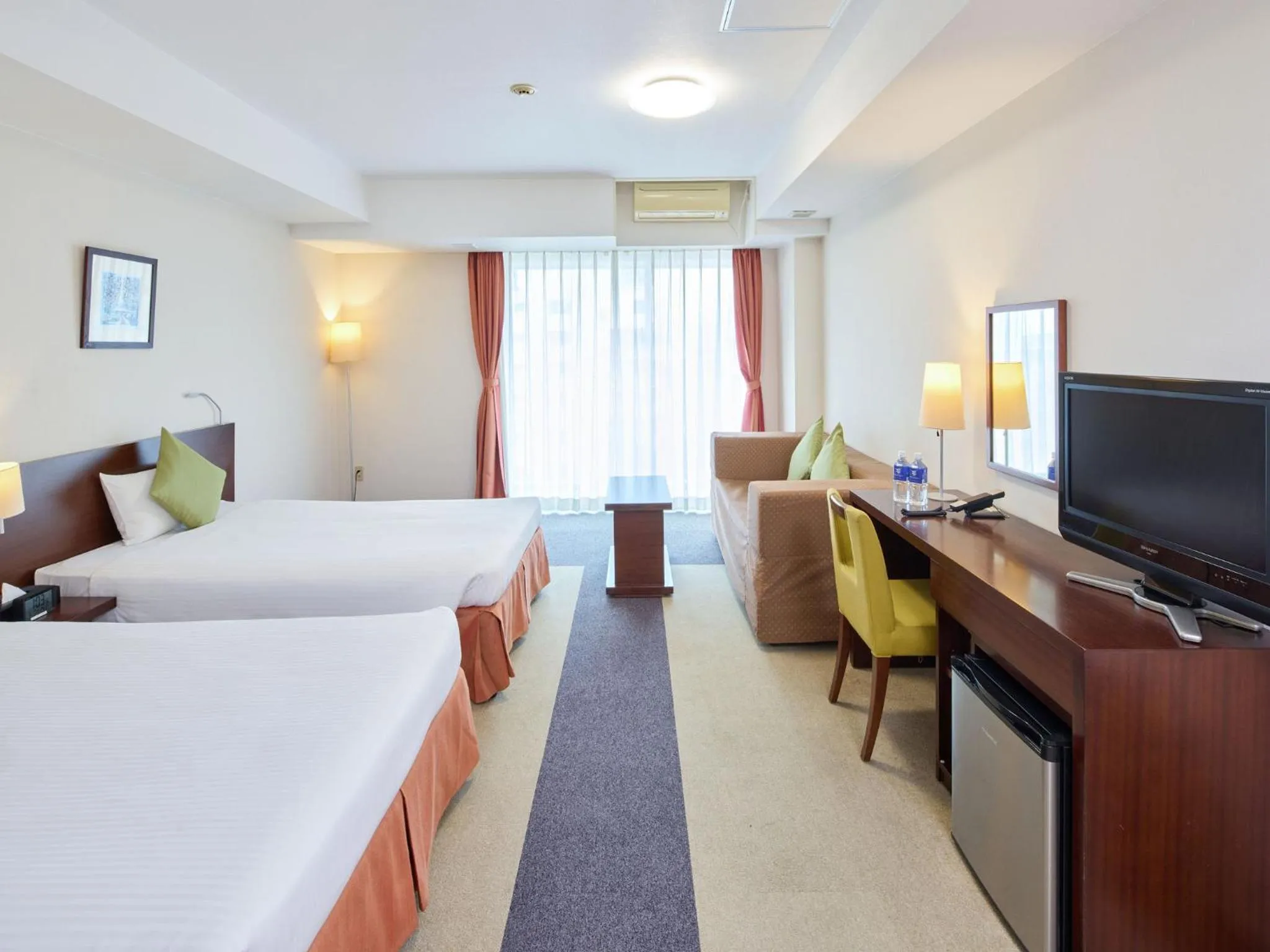 Bed in Hotel Yugaf Inn Okinawa