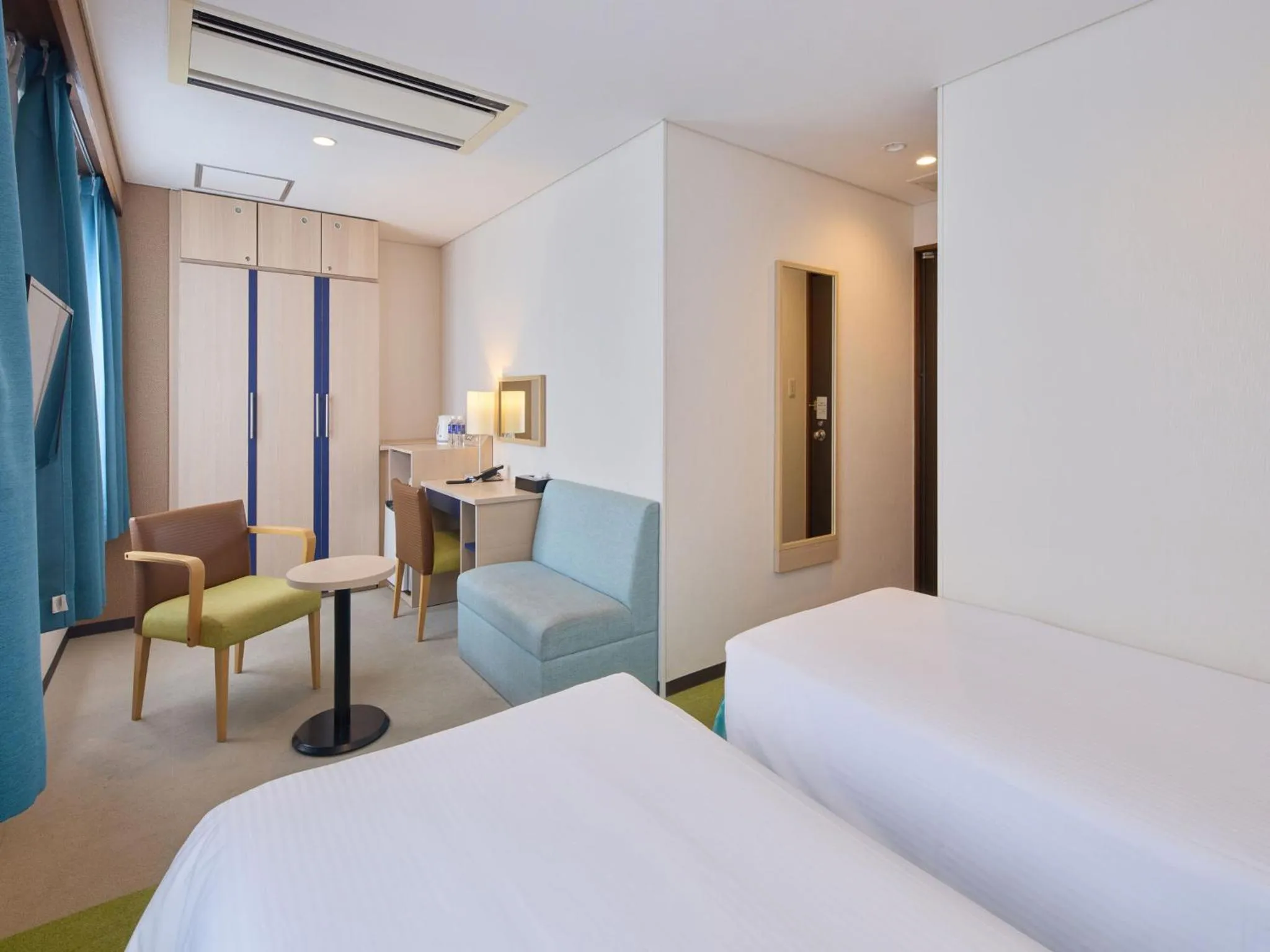 Bed in Hotel Yugaf Inn Okinawa