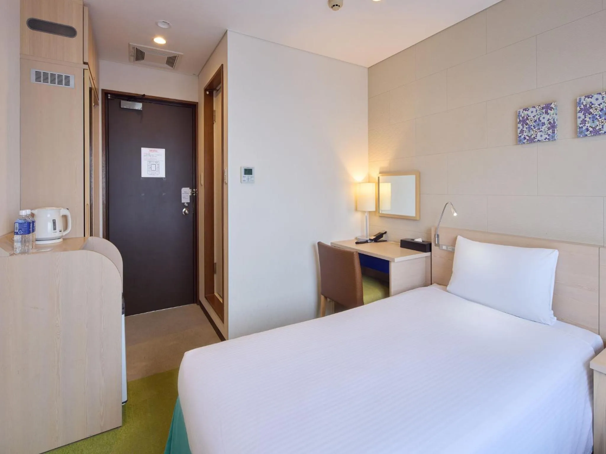 Bed in Hotel Yugaf Inn Okinawa