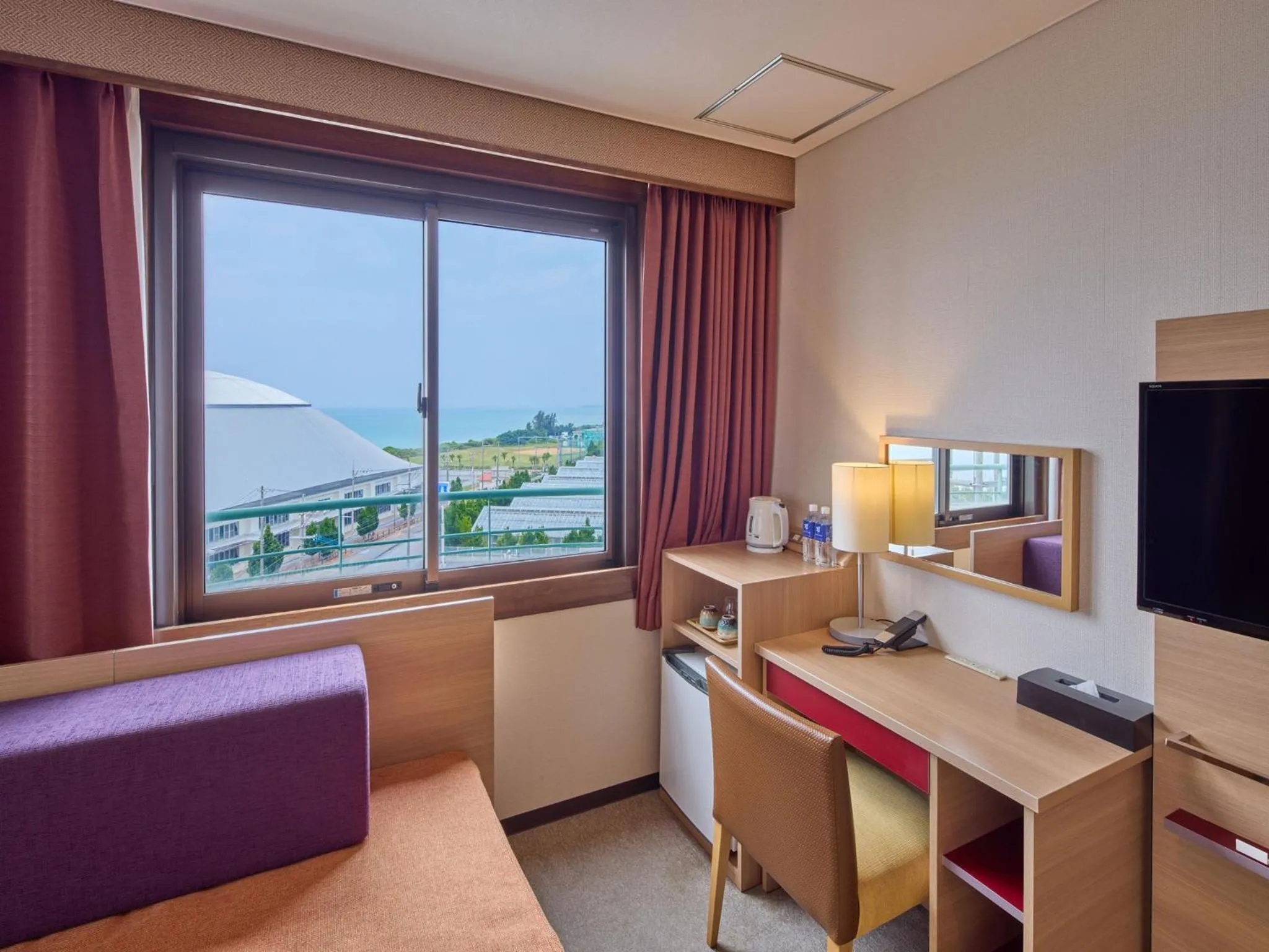 Photo of the whole room, Bed in Hotel Yugaf Inn Okinawa