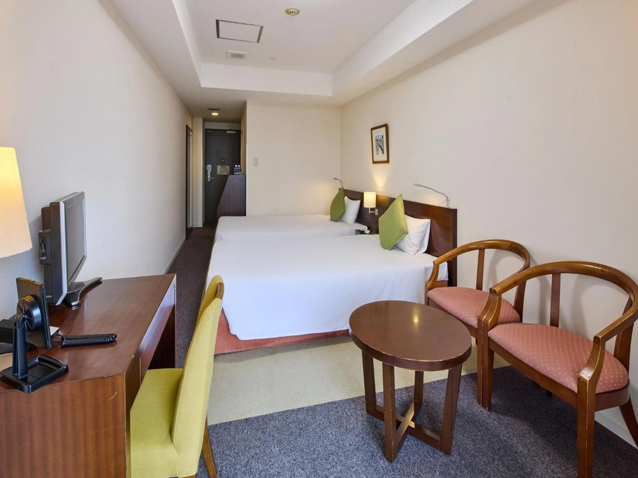 Bed in Hotel Yugaf Inn Okinawa