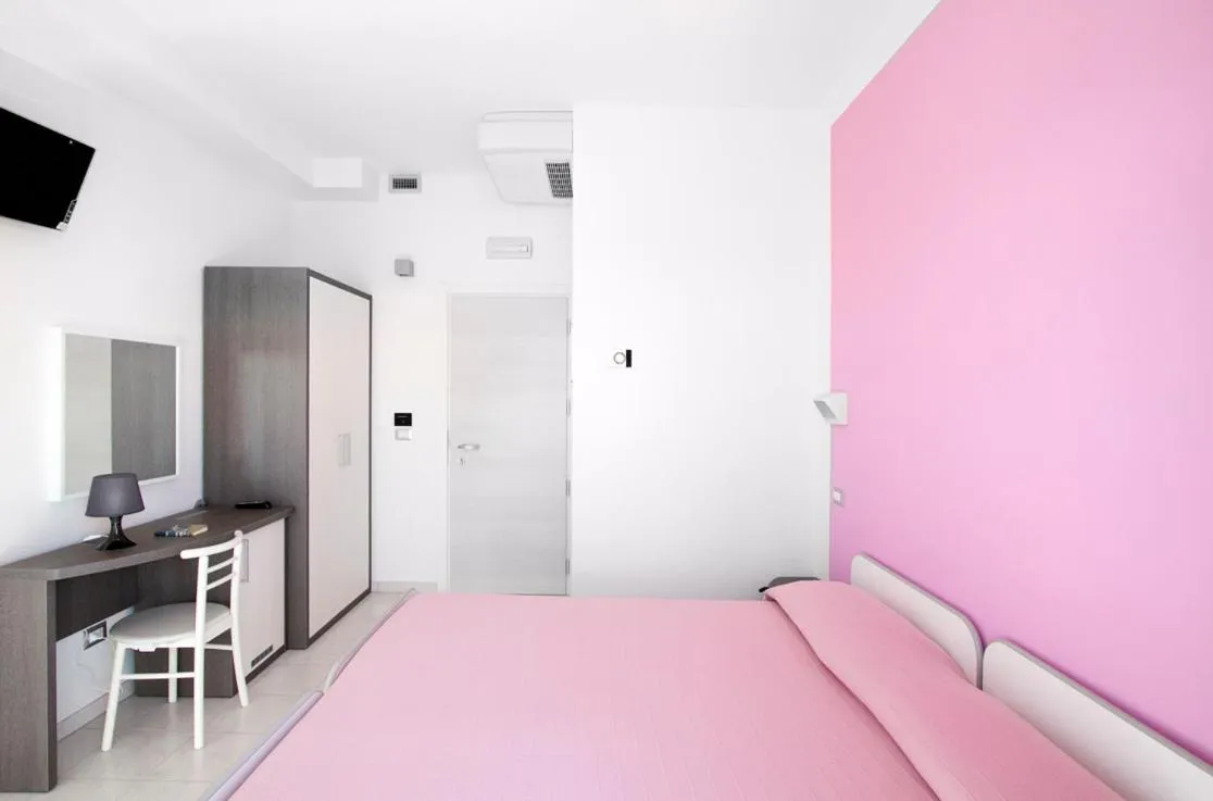 Bed in Hotel La Maestra