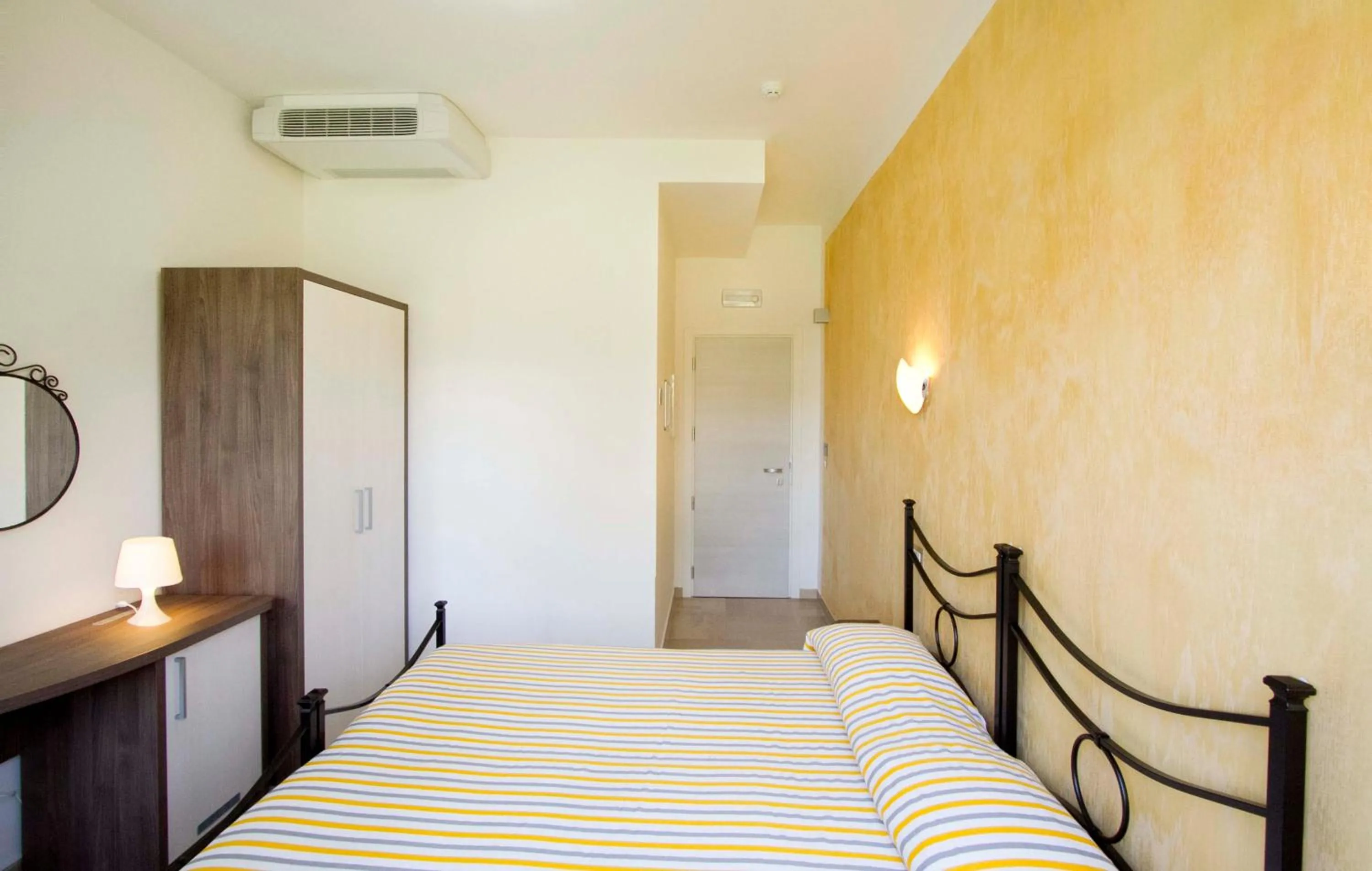 Bed in Hotel La Maestra