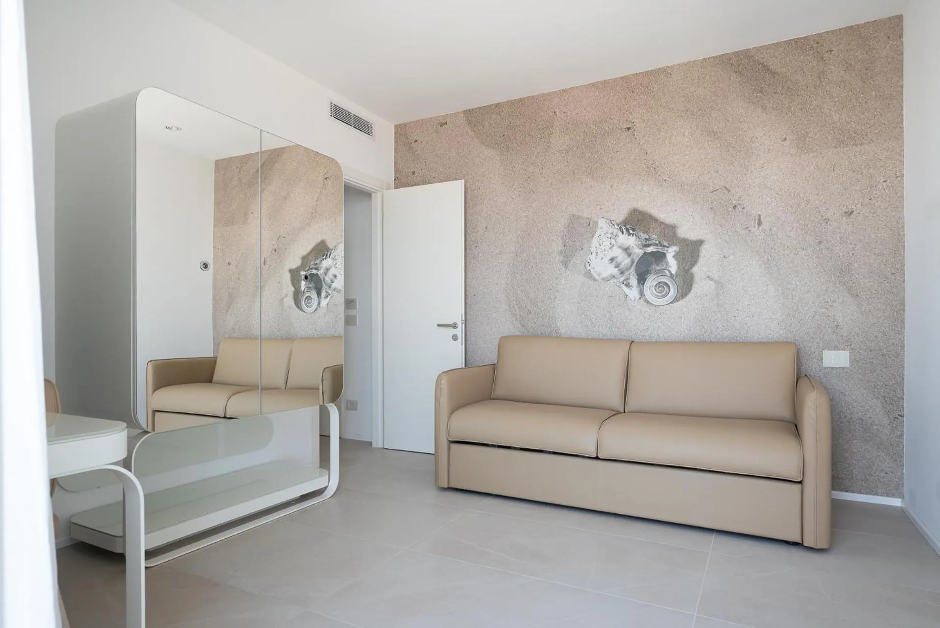 Living room in Unico Hotel Caorle