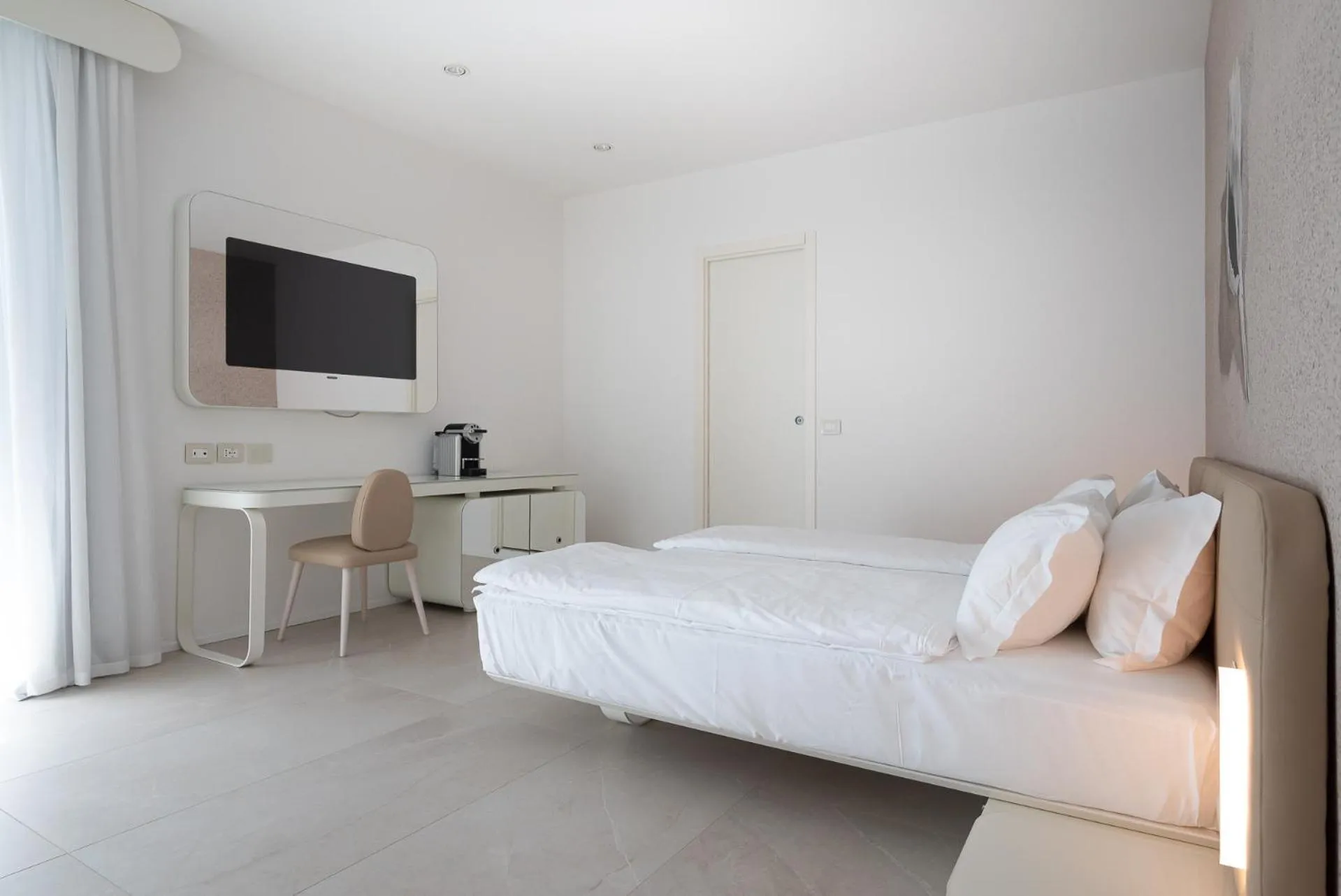 Bed in Unico Hotel Caorle