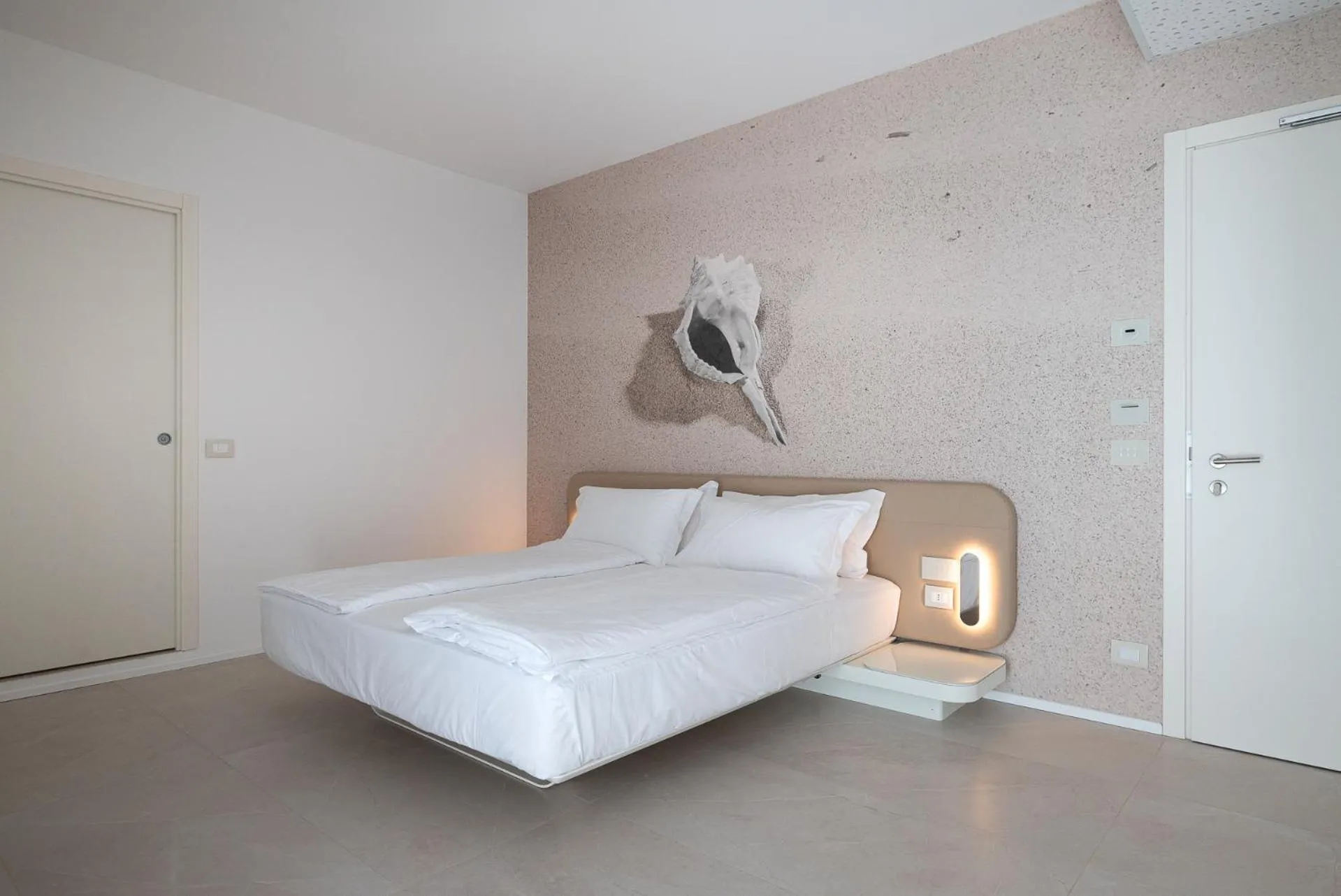 Bed in Unico Hotel Caorle