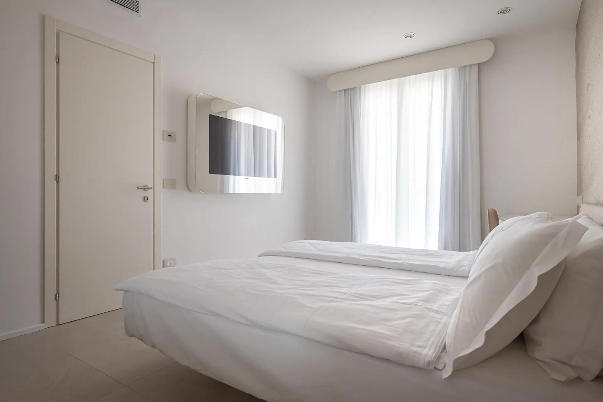 Bed in Unico Hotel Caorle