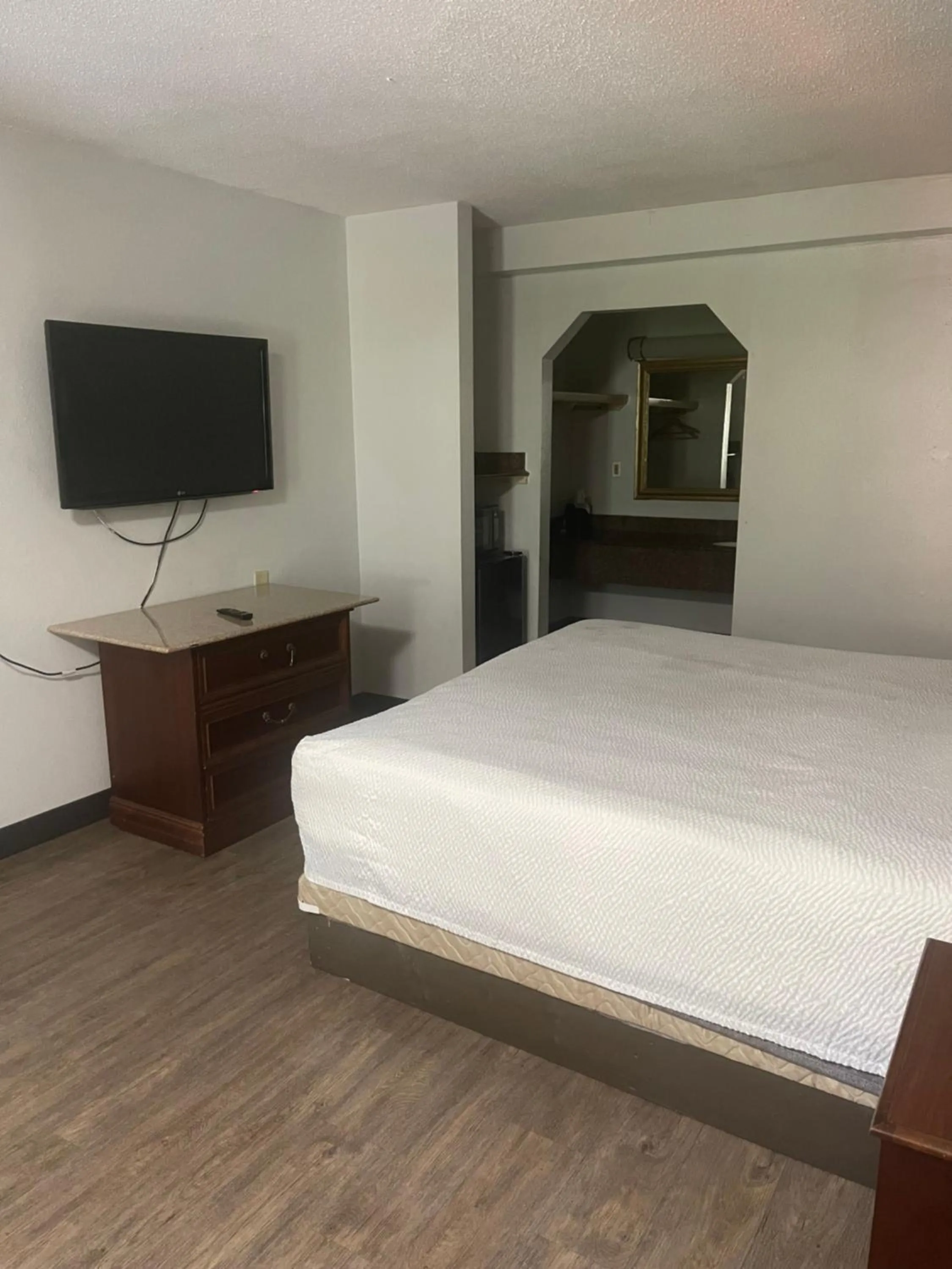 Bed in FairBridge Inn & Suites