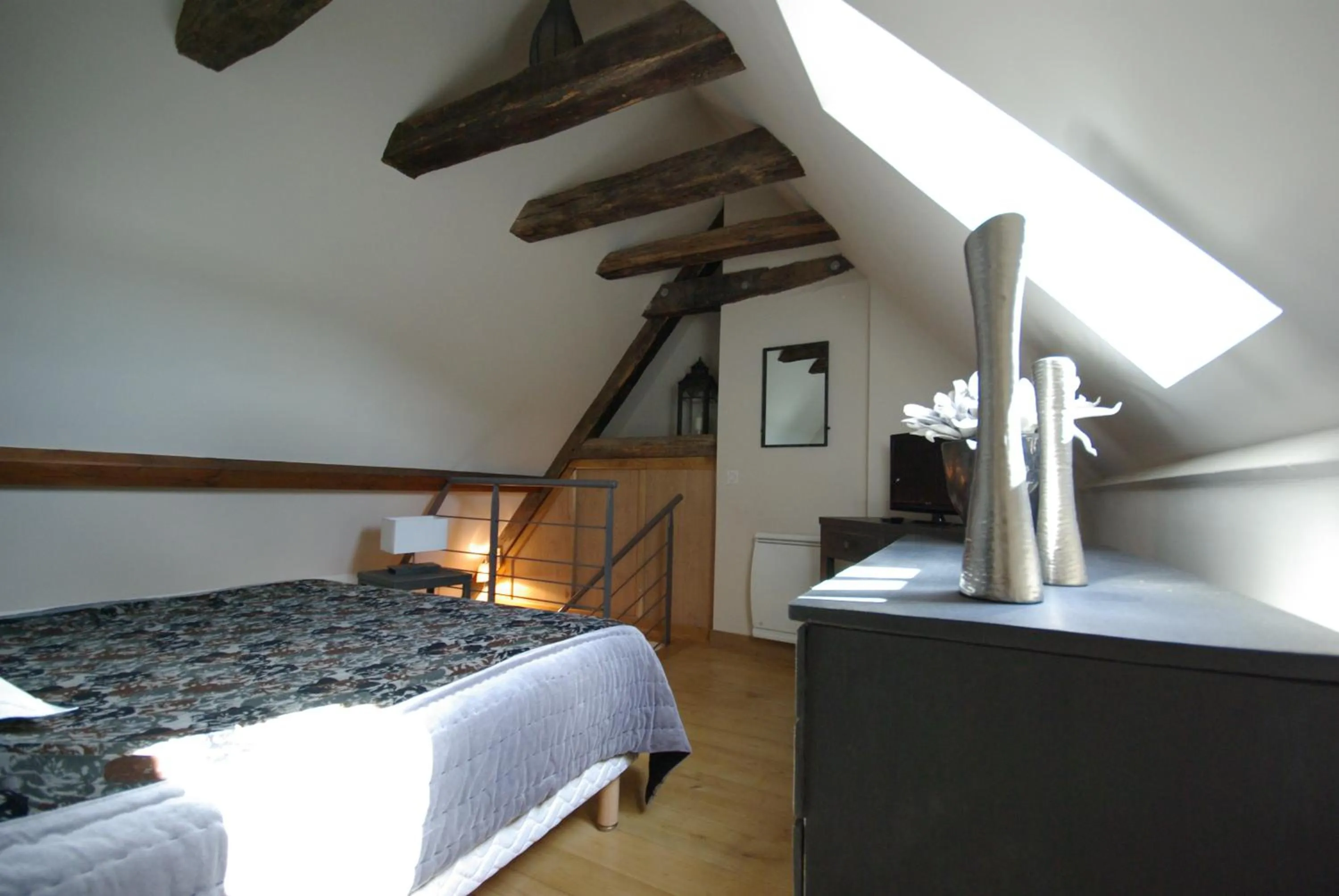 Bed in LogisHotels Le Relais du Quercy