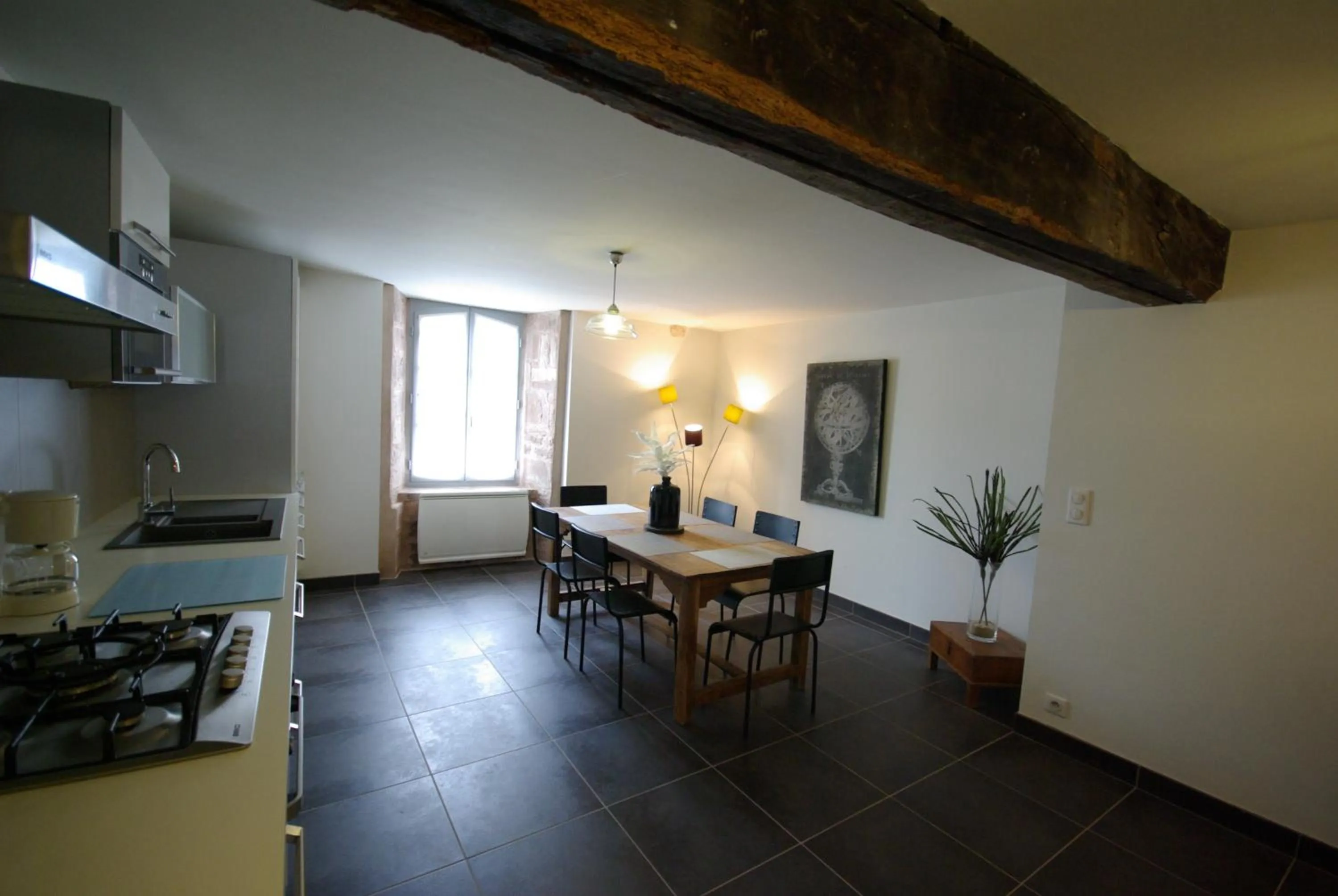 Kitchen or kitchenette in LogisHotels Le Relais du Quercy