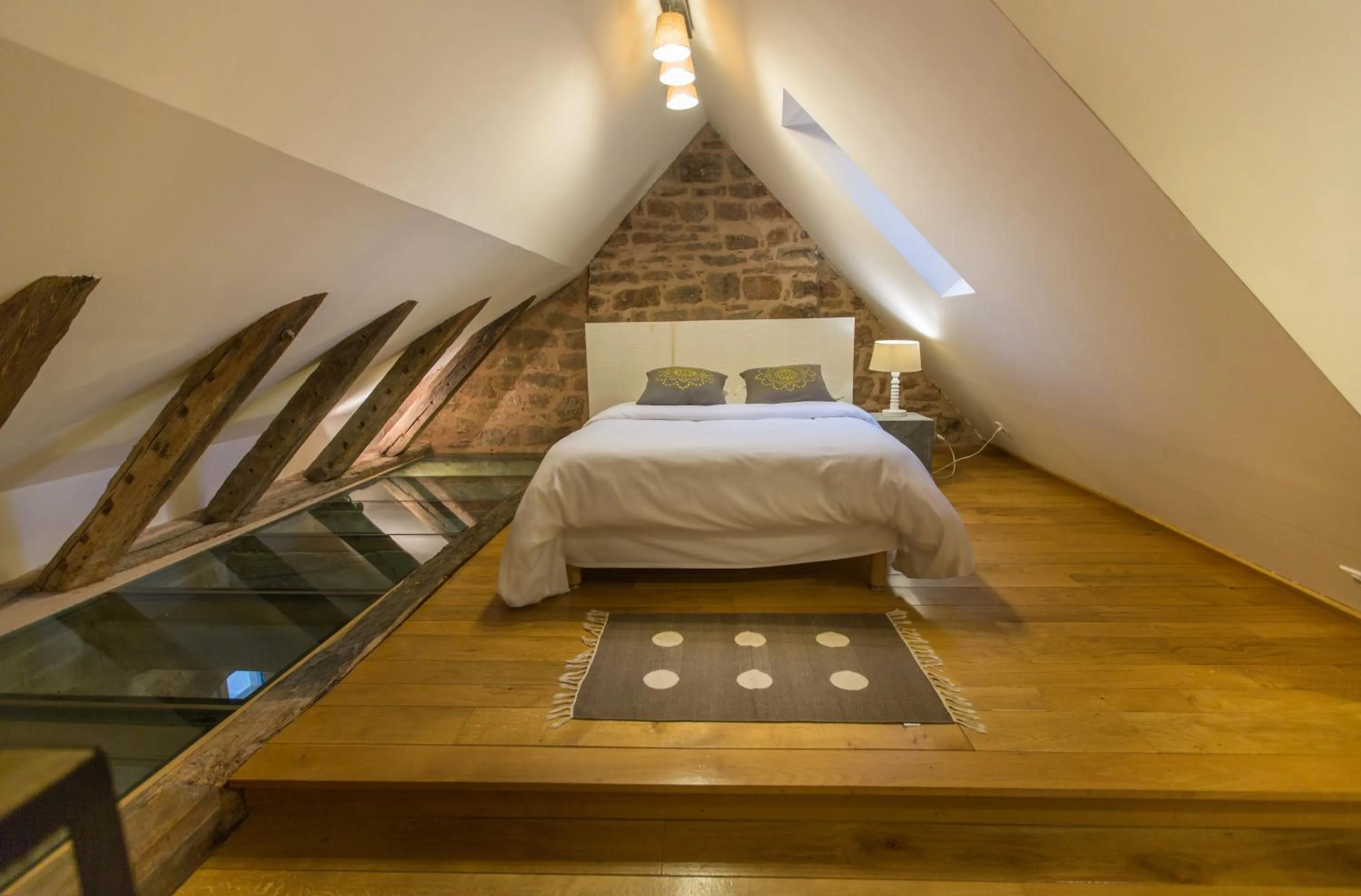 Bed in LogisHotels Le Relais du Quercy