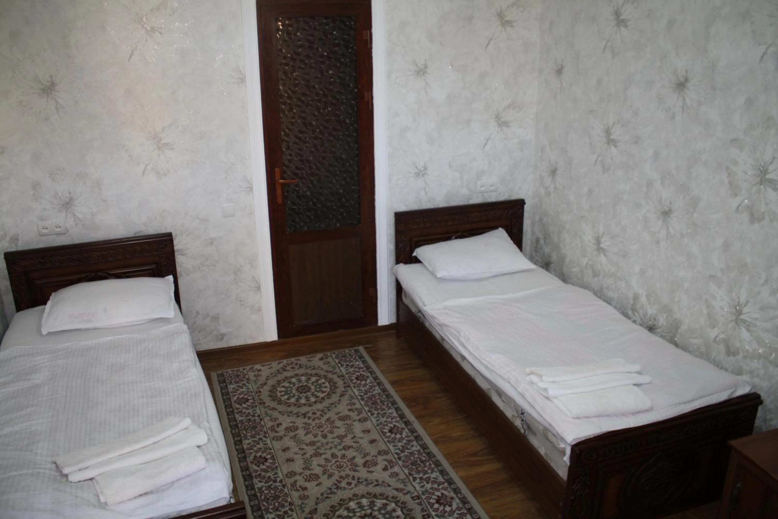 Bed in Tilyakori Hotel