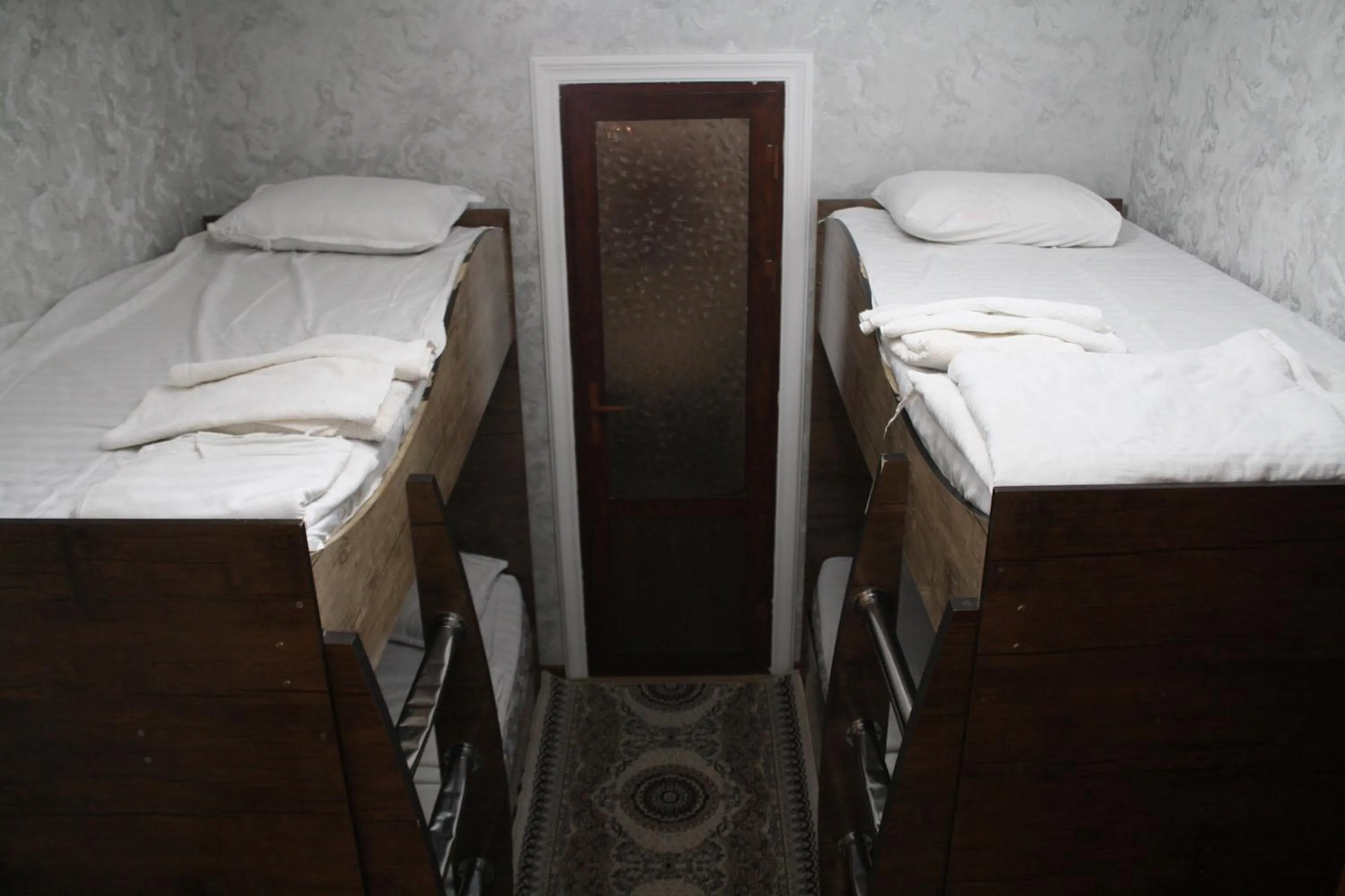 Bed in Tilyakori Hotel