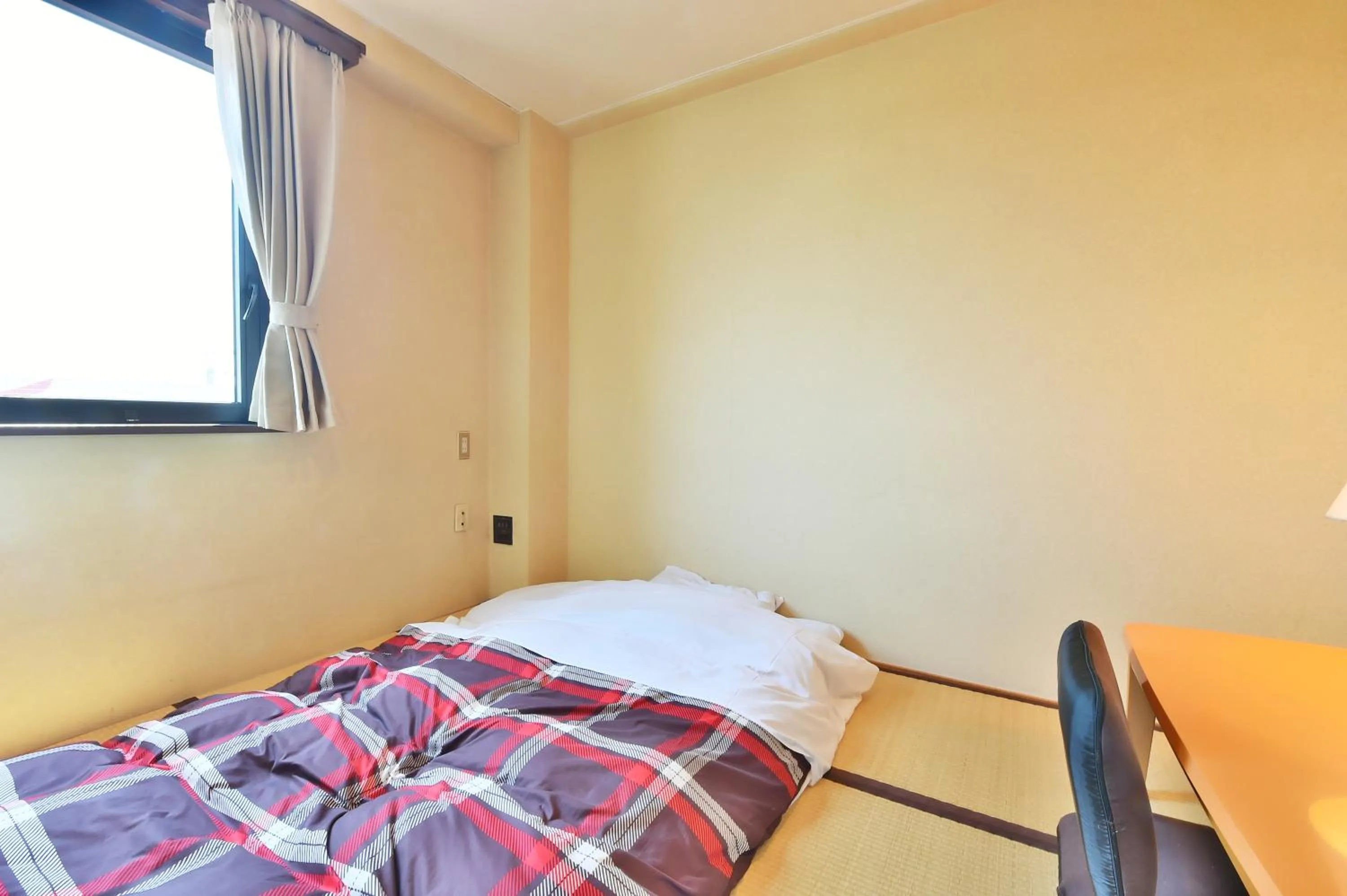 Bed in Suzuka Royal Hotel