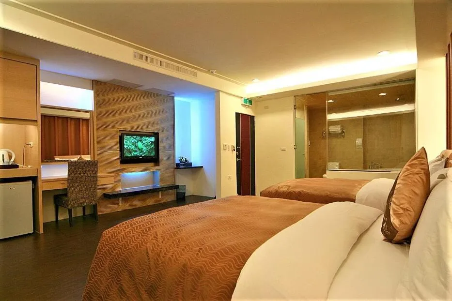 Bed in Tranquil Sea Hotel