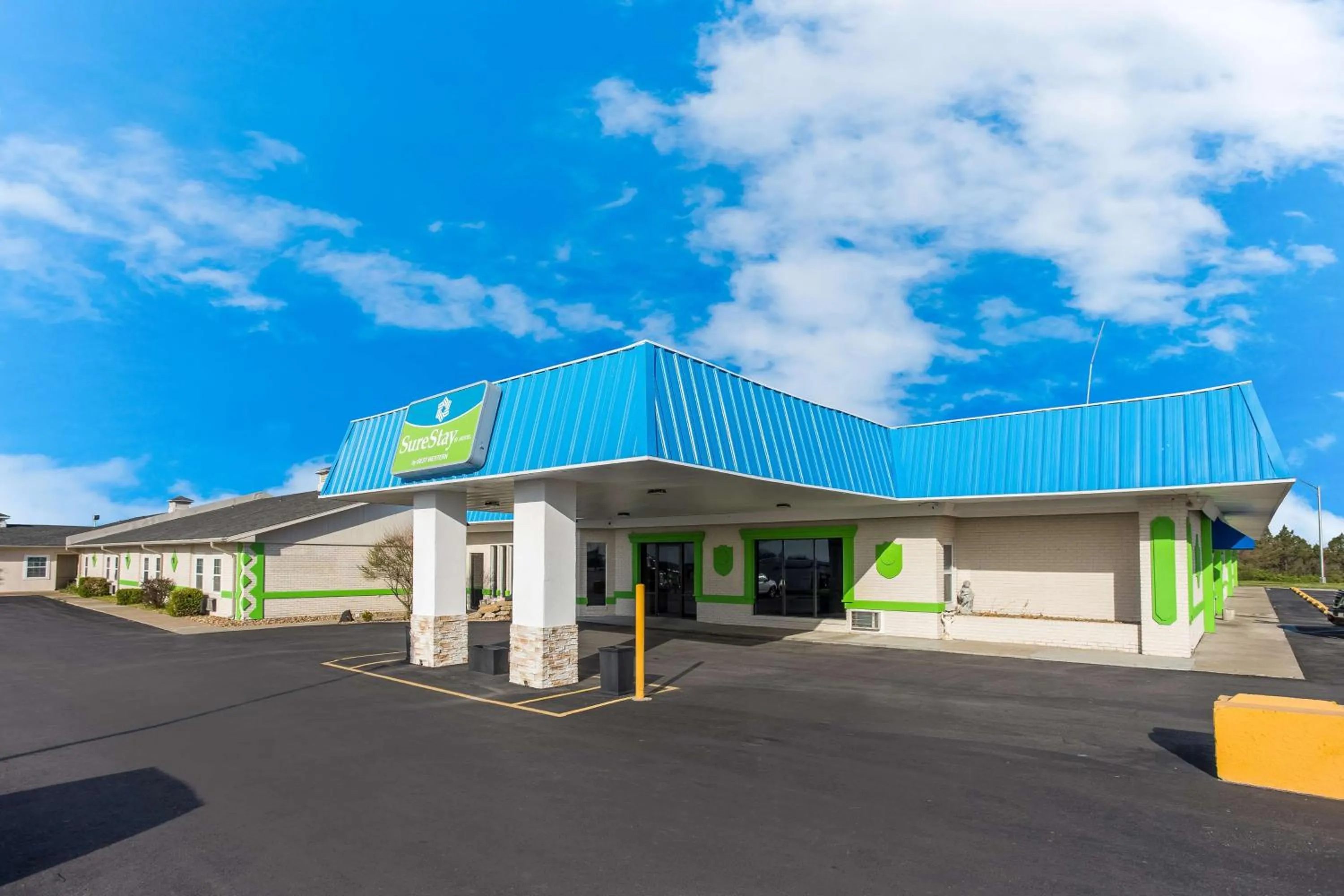 Property building in SureStay Hotel by Best Western Higginsville