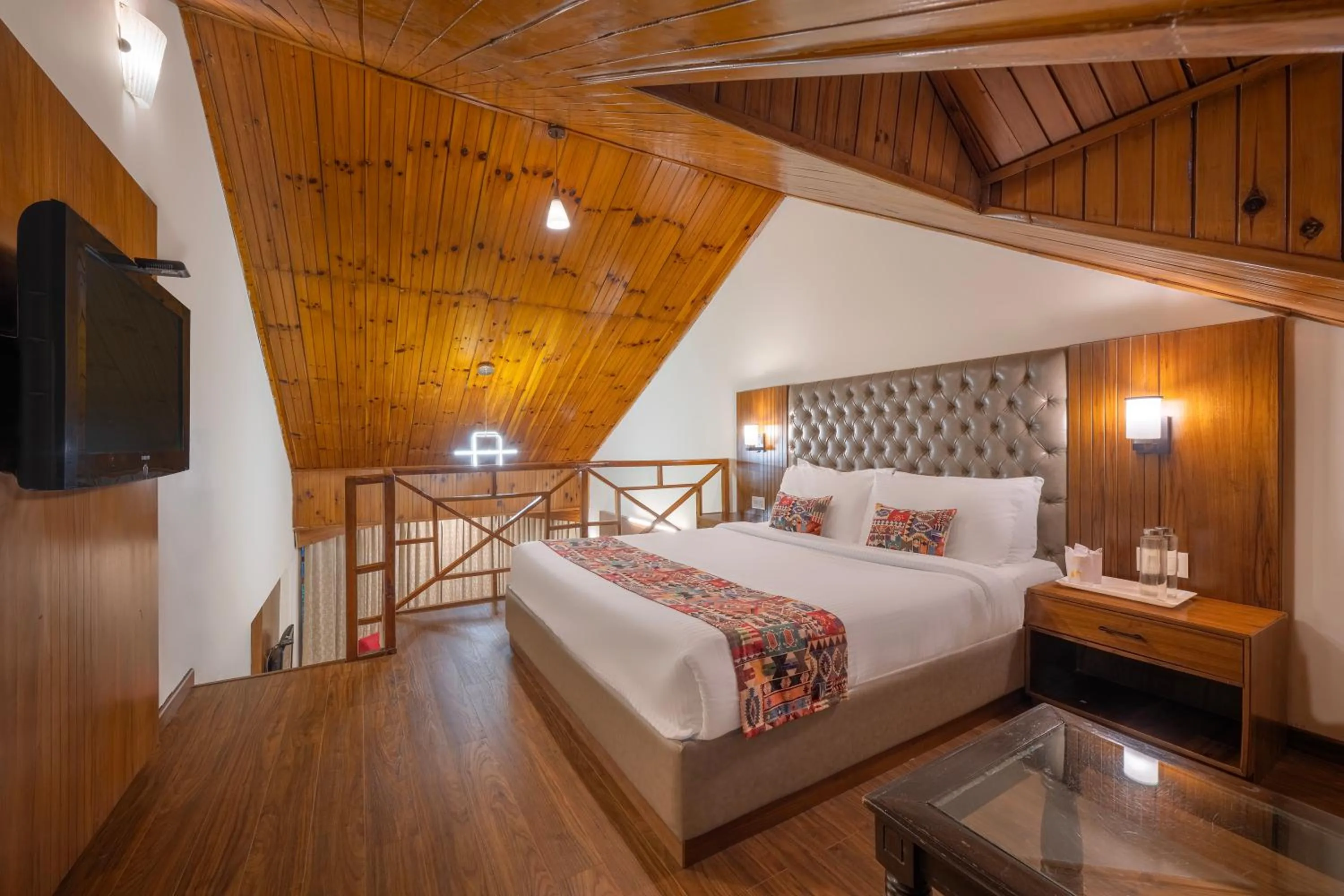 Bed in Snow Valley Resorts & Spa Manali