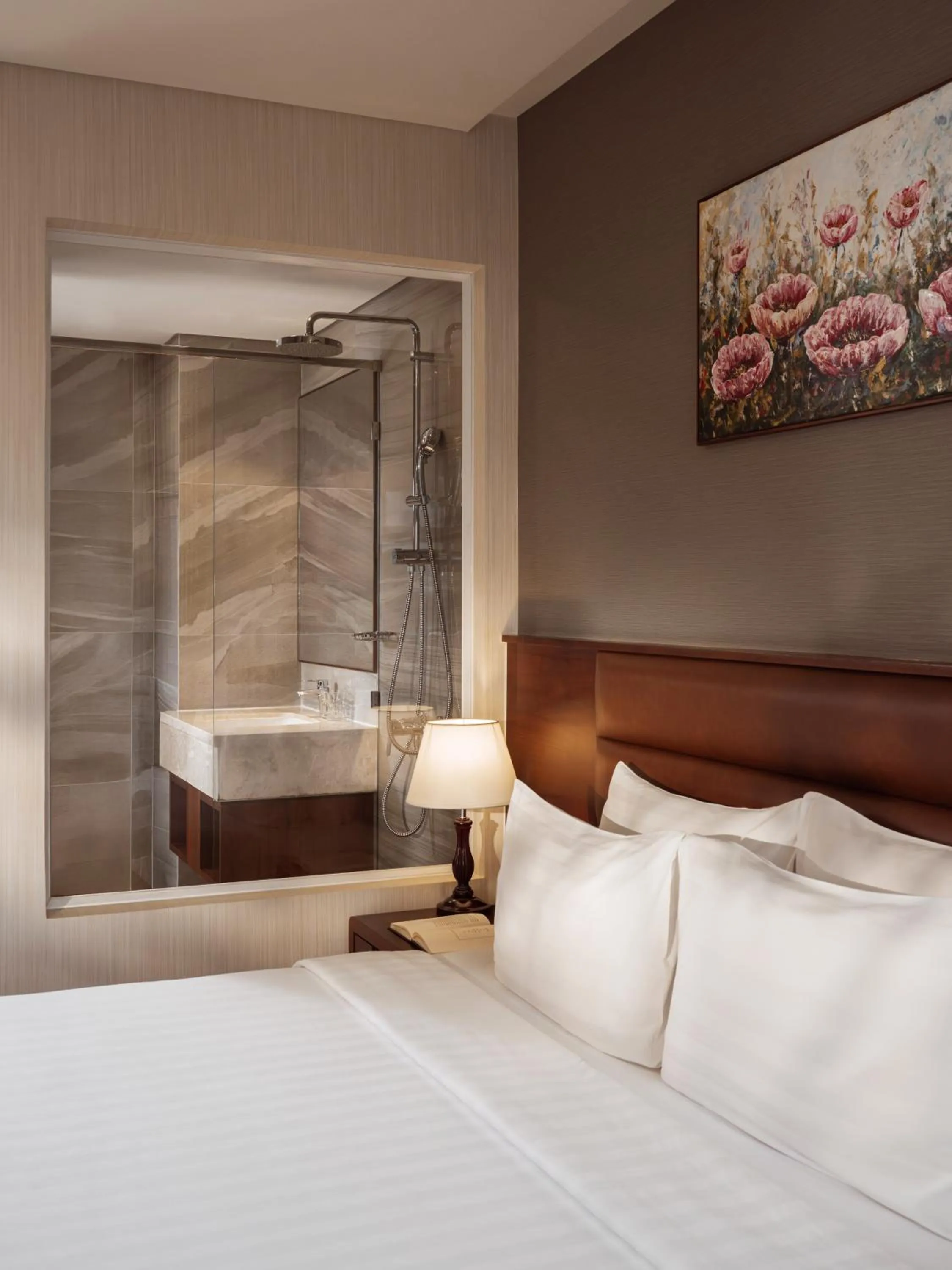 Shower, Bed in Orchids Saigon Hotel