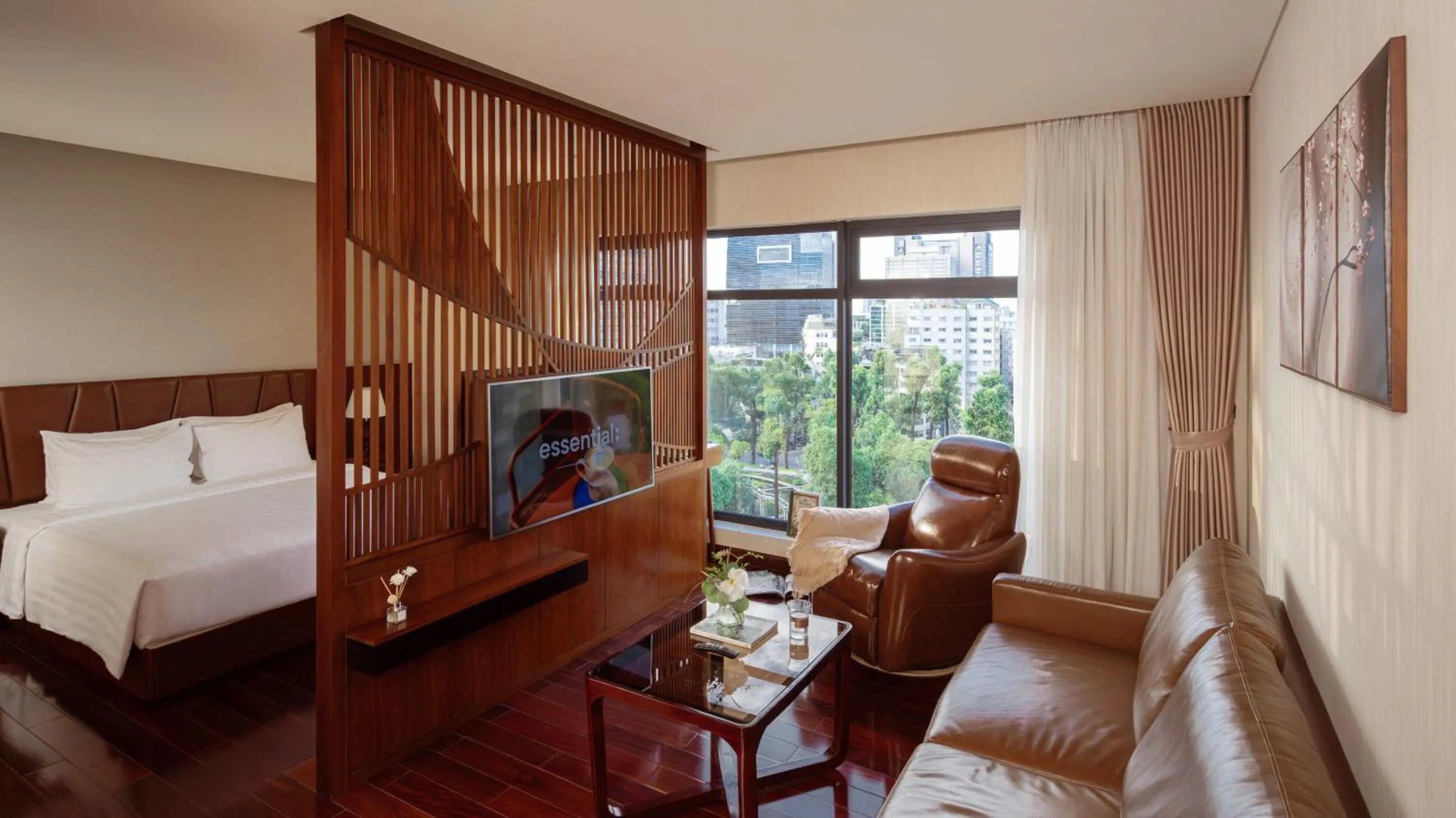 Bed in Orchids Saigon Hotel