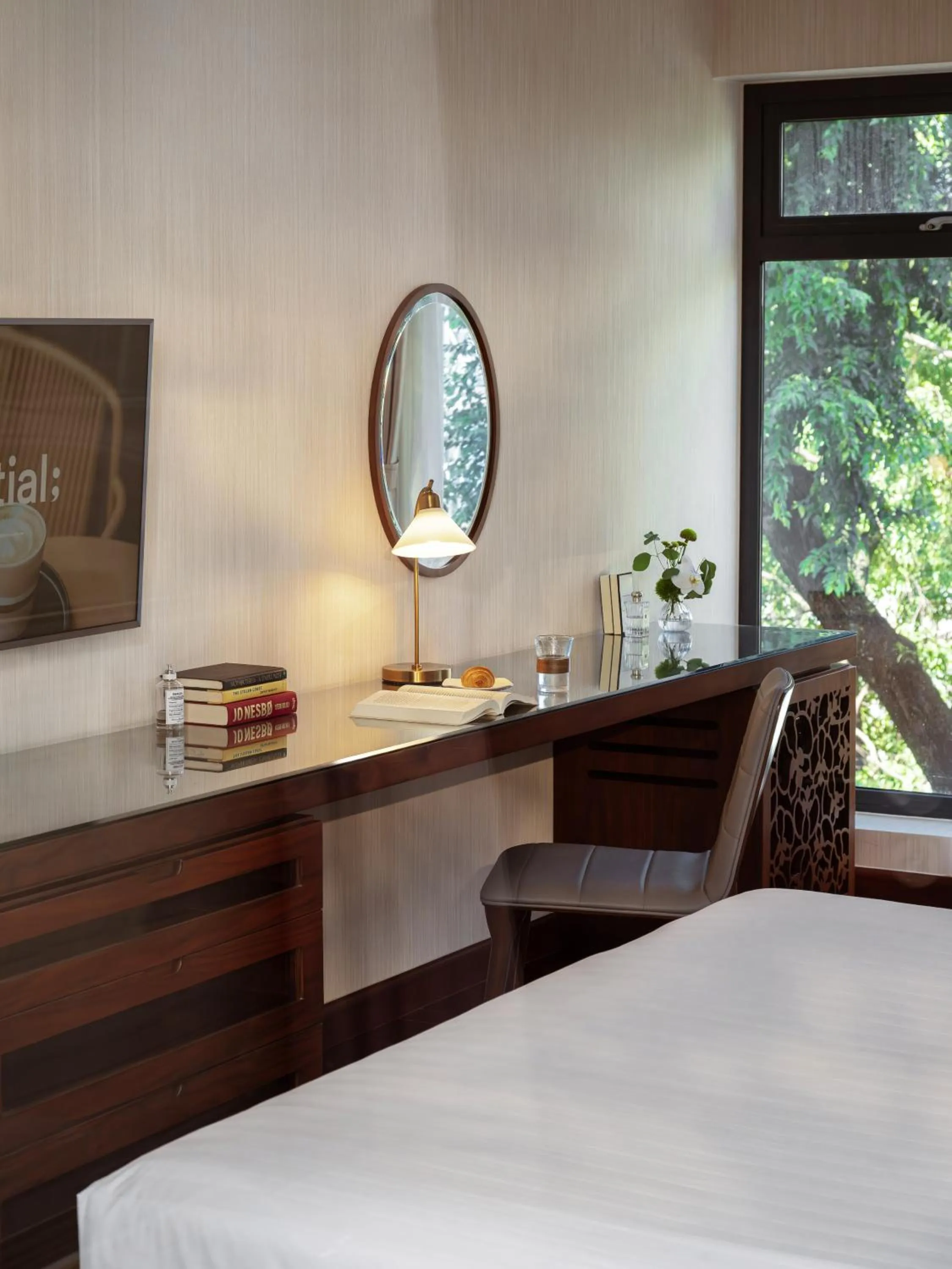 Bed in Orchids Saigon Hotel